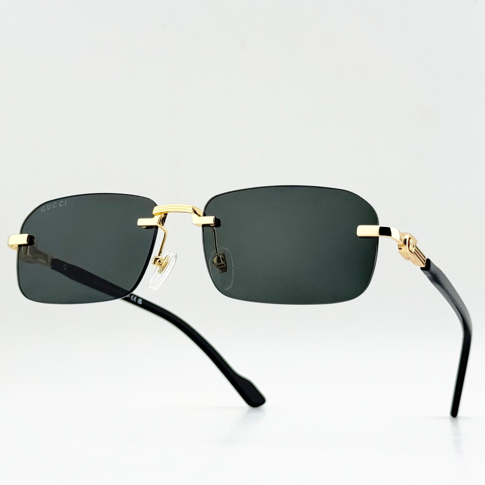 Gucci GG1221S 001 Rimless Gold Black Gray Lens Sunglasses 56mm Men’s