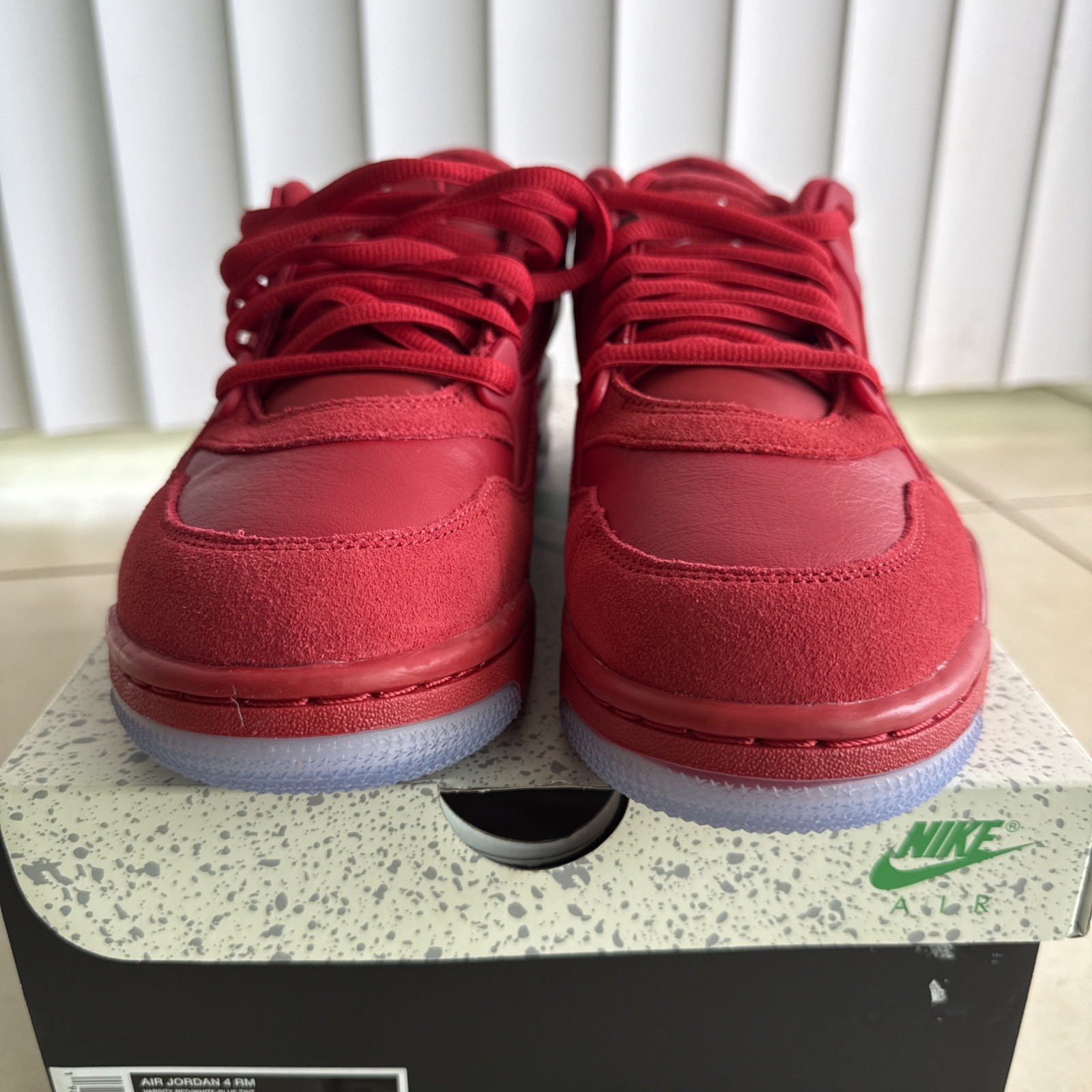 Size 9.5 – Air Jordan 4 RM Varsity Red
