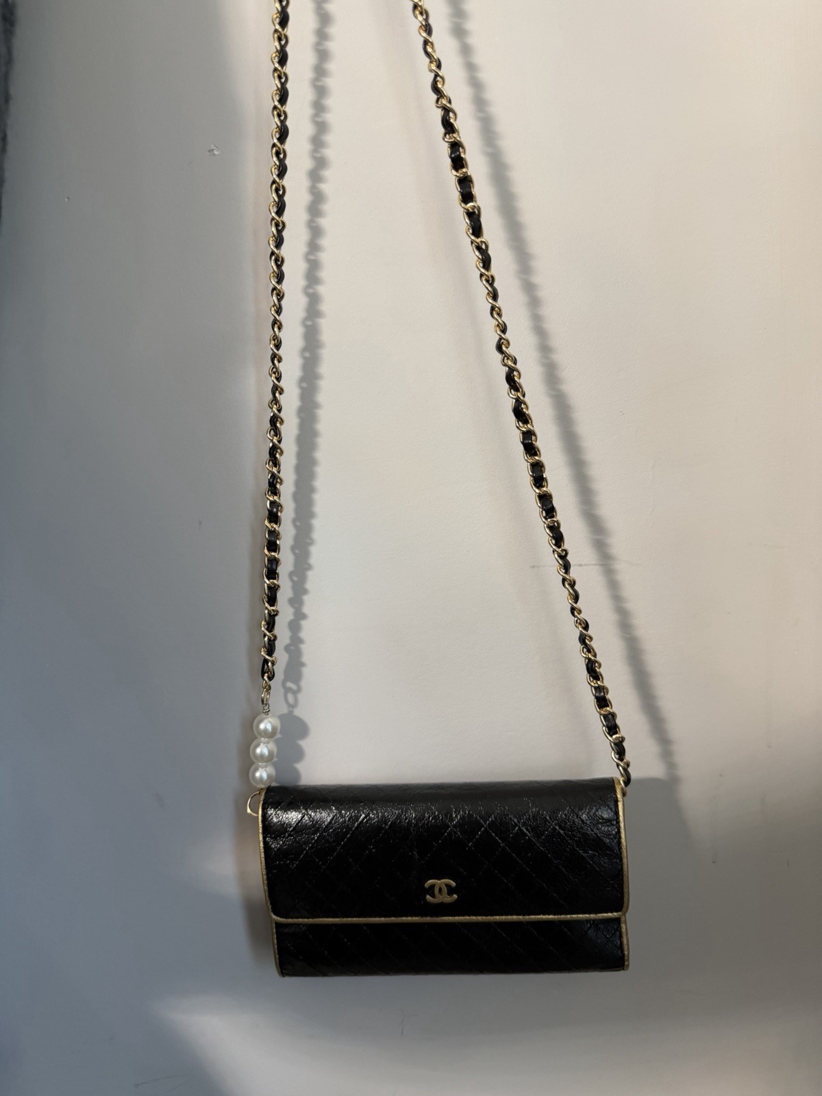 CHANEL Black Quilted Flap WOC Gold Hardware Chain Strap Pearl Accents