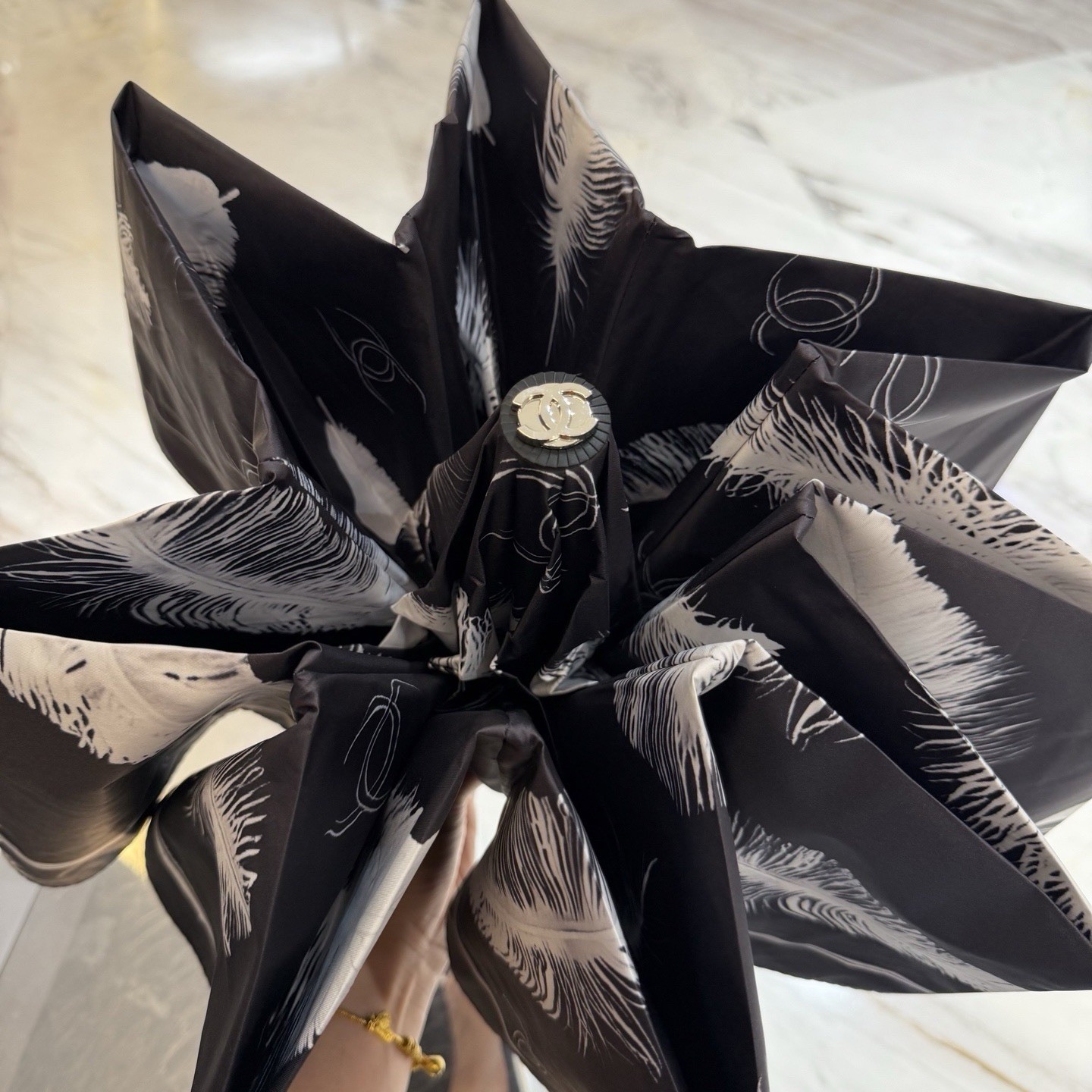 CHANEL Black/White Compact Folding Umbrella Feather Pattern Logo Accent