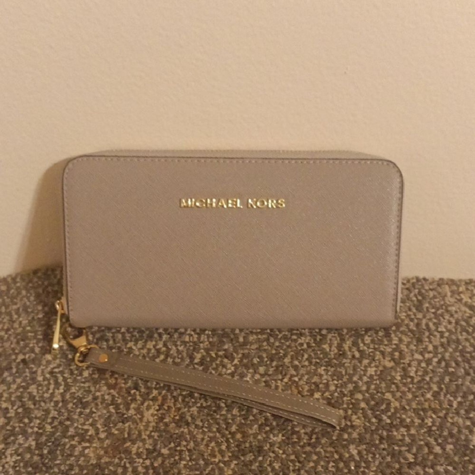 Michael Kors Gray Wristlet with Gold Details