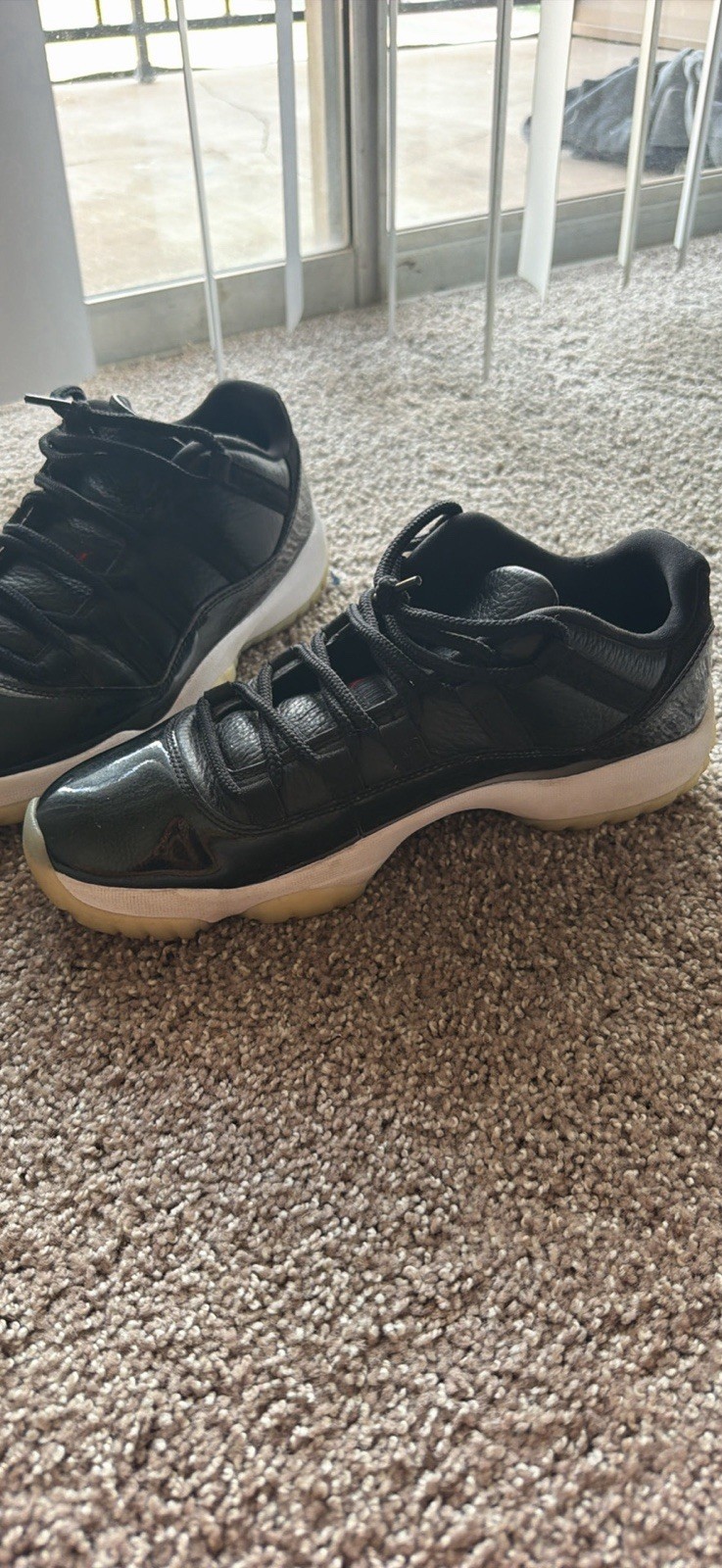 Jordan Air Jordan 11 Low Top Men’s Black/White Basketball Lace-Up Sneakers
