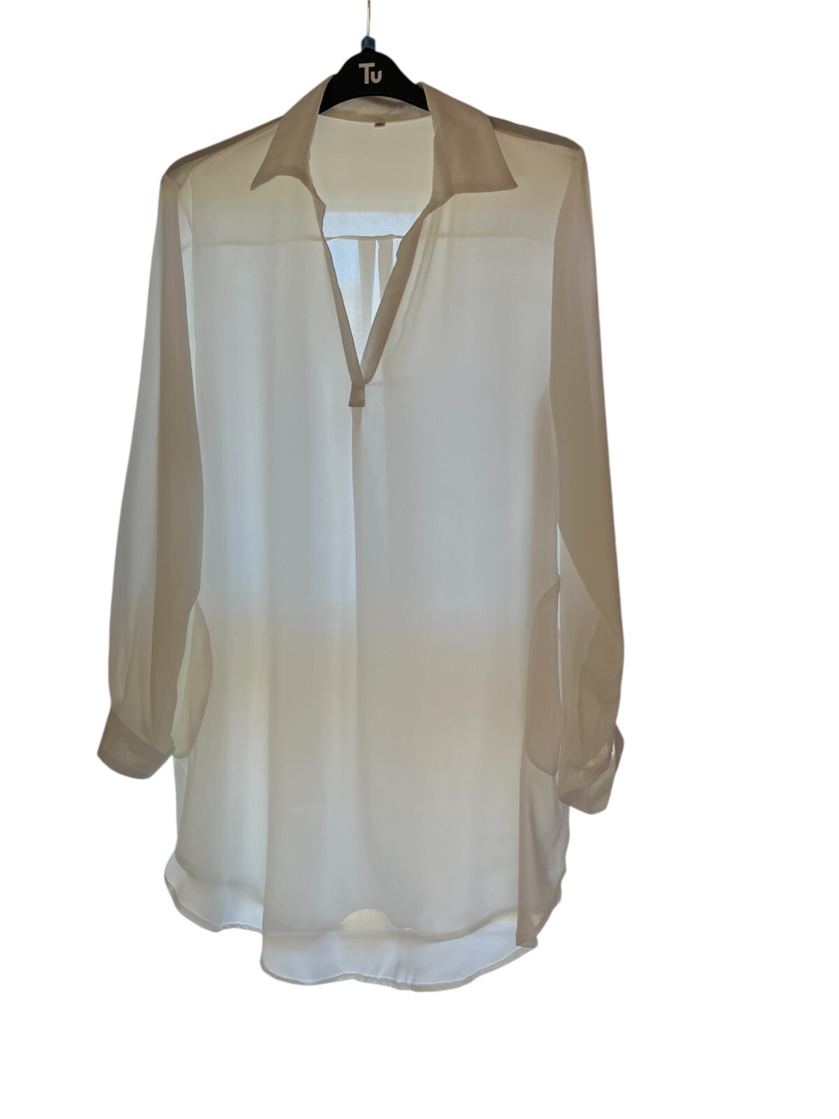 Size 5XL (22) Loose chiffon type cream coloured over blouse.