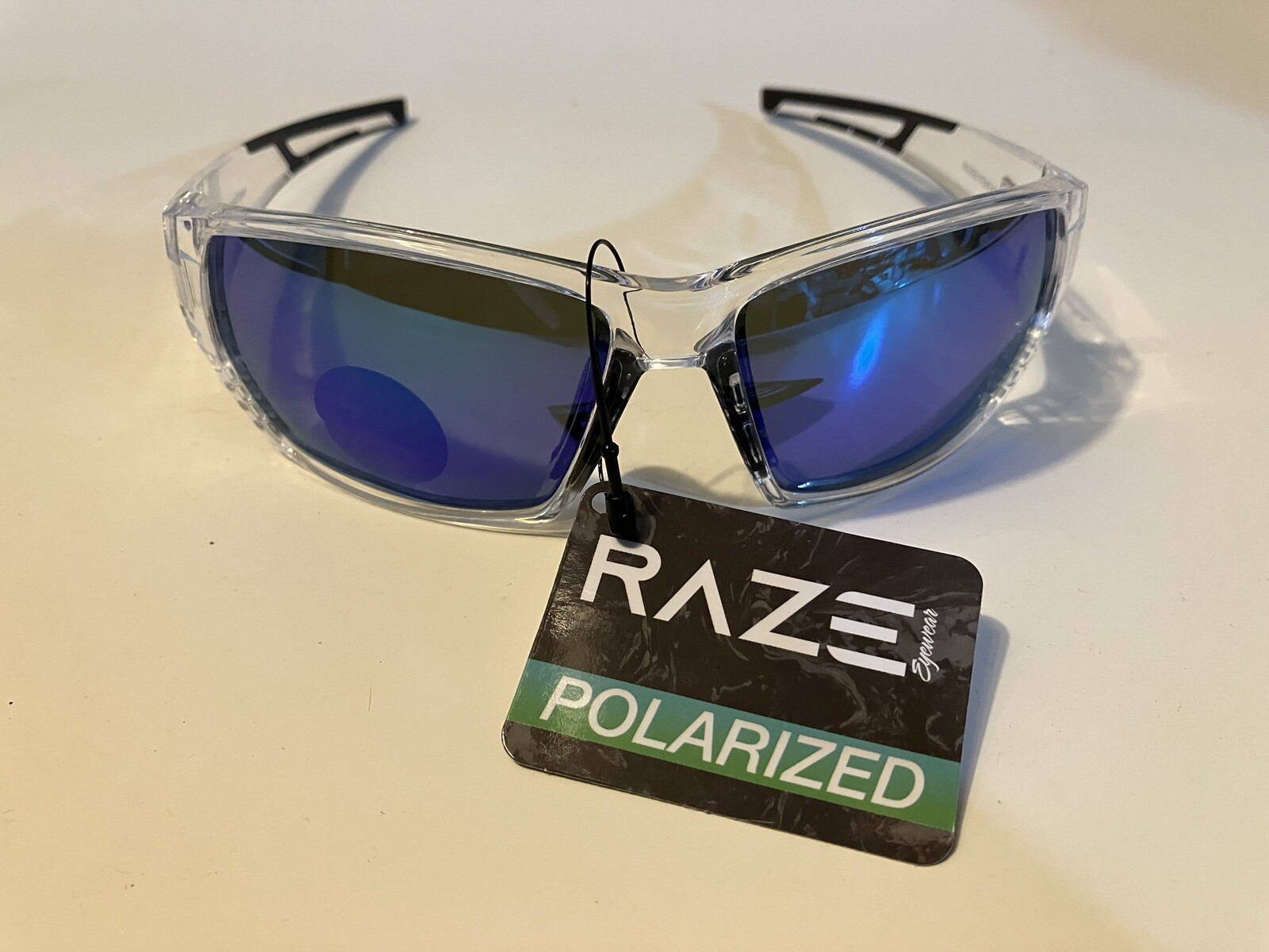 RAZE Eyewear Sunglasses Sonar Polarized Clear Frame Blue Mirror Smoke 28856