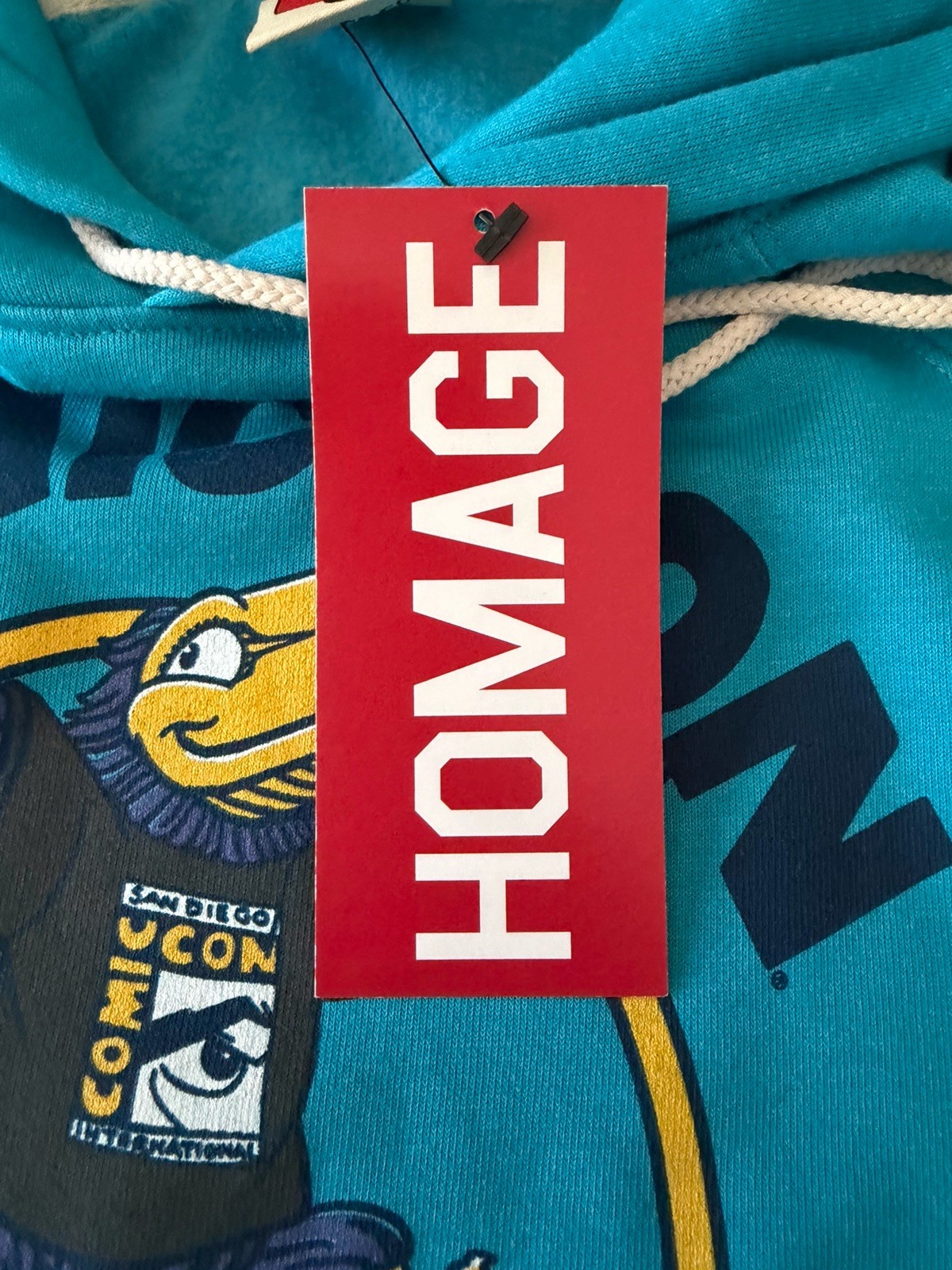 NWT! [S] San Diego COMIC CON SDCC Int’l Hoodie Blue Surf Toucan Official Merch