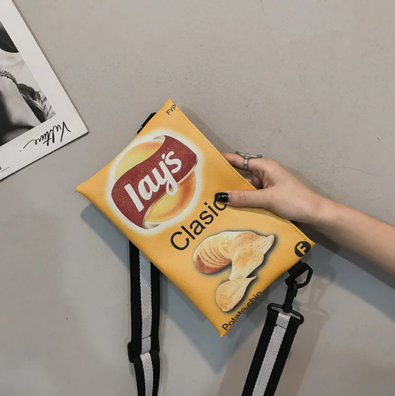 Elevate your style with this delightful Funny Potato Chips Crossbody Handbag! Cr