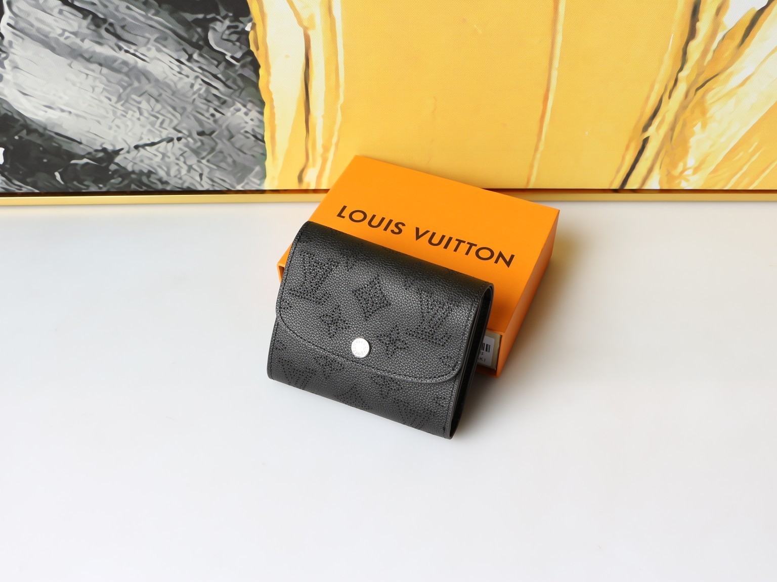 LOUIS Black Mahina Perforated Leather Iris Compact Wallet