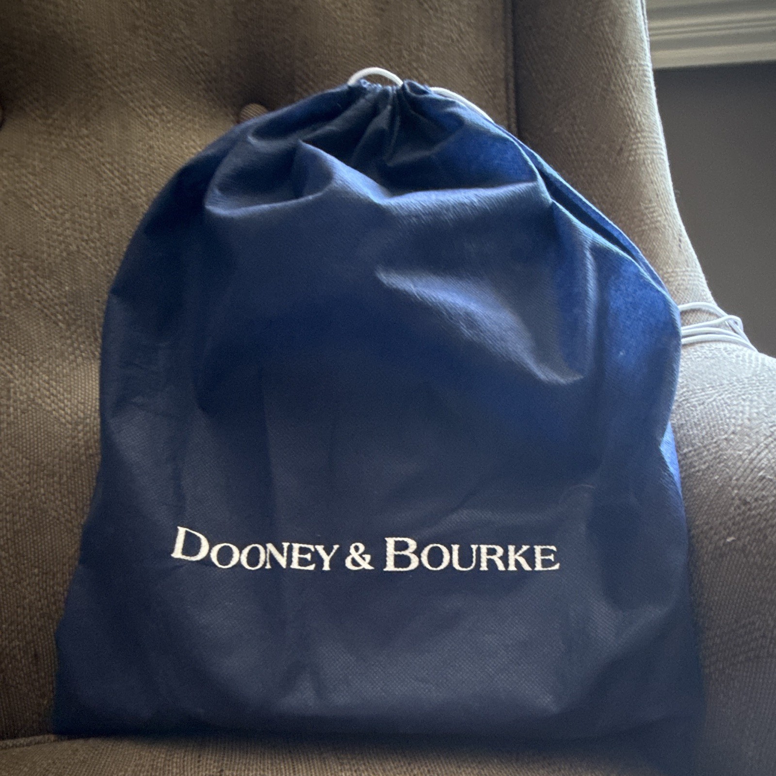 Dooney & Bourke Pebble Grain Blue/Brown Crossbody Zip, Adjustable Strap, Pockets