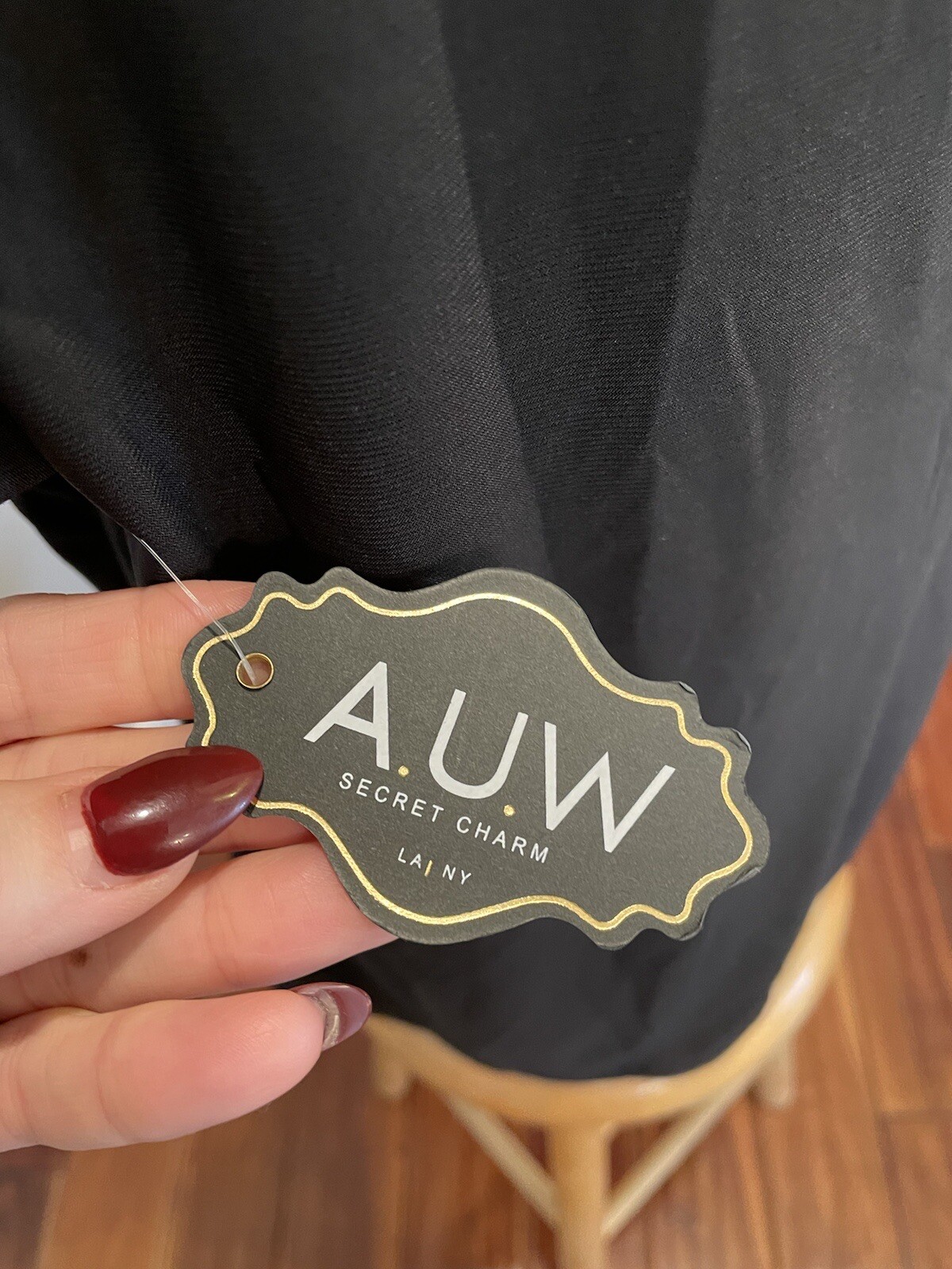 Black round neck cap sleeve blouse with gold Bar Detailing A.U.W. Women’s Large