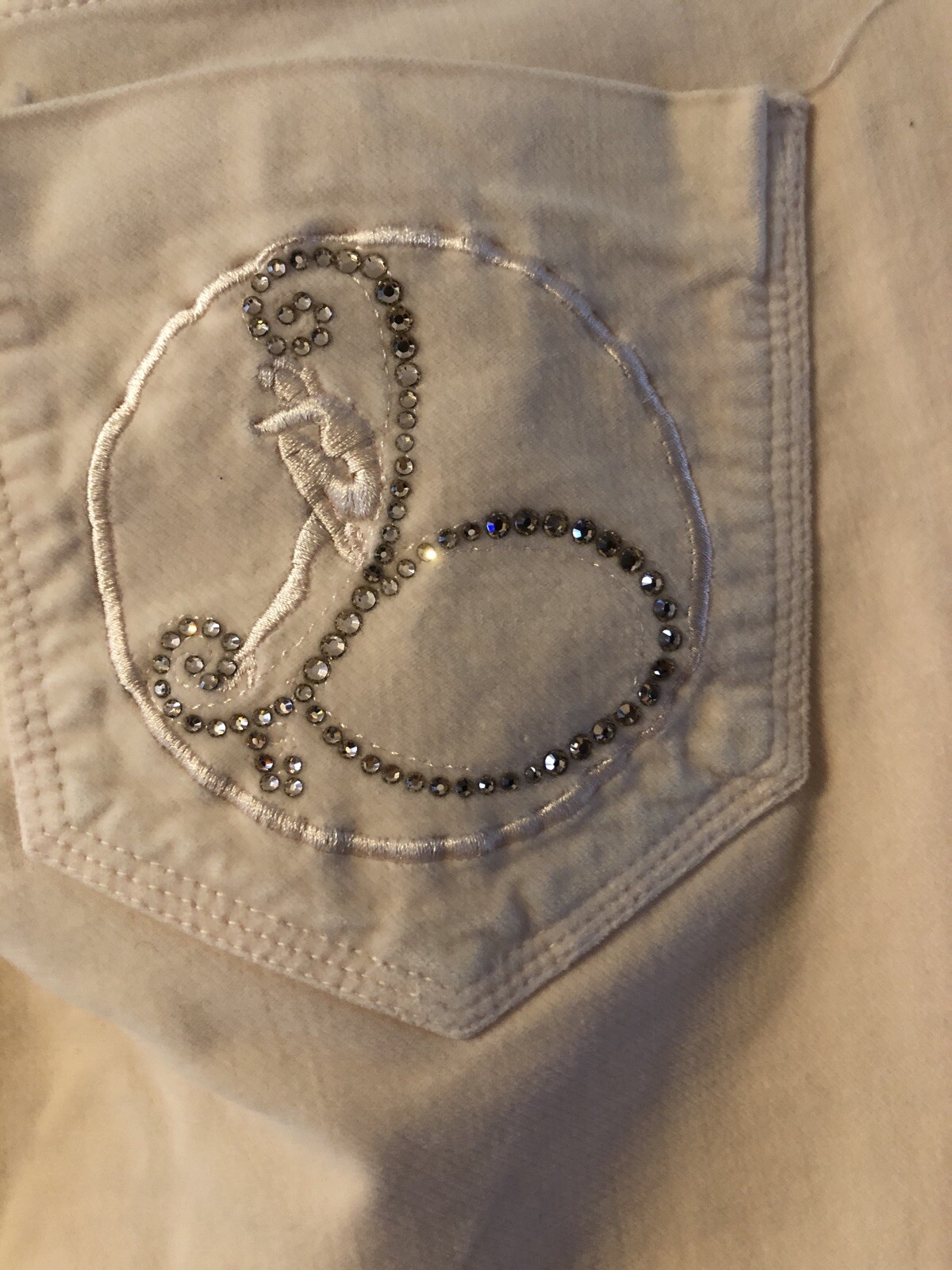 Bebe Size 27 Stretch to the fabric Good Condition