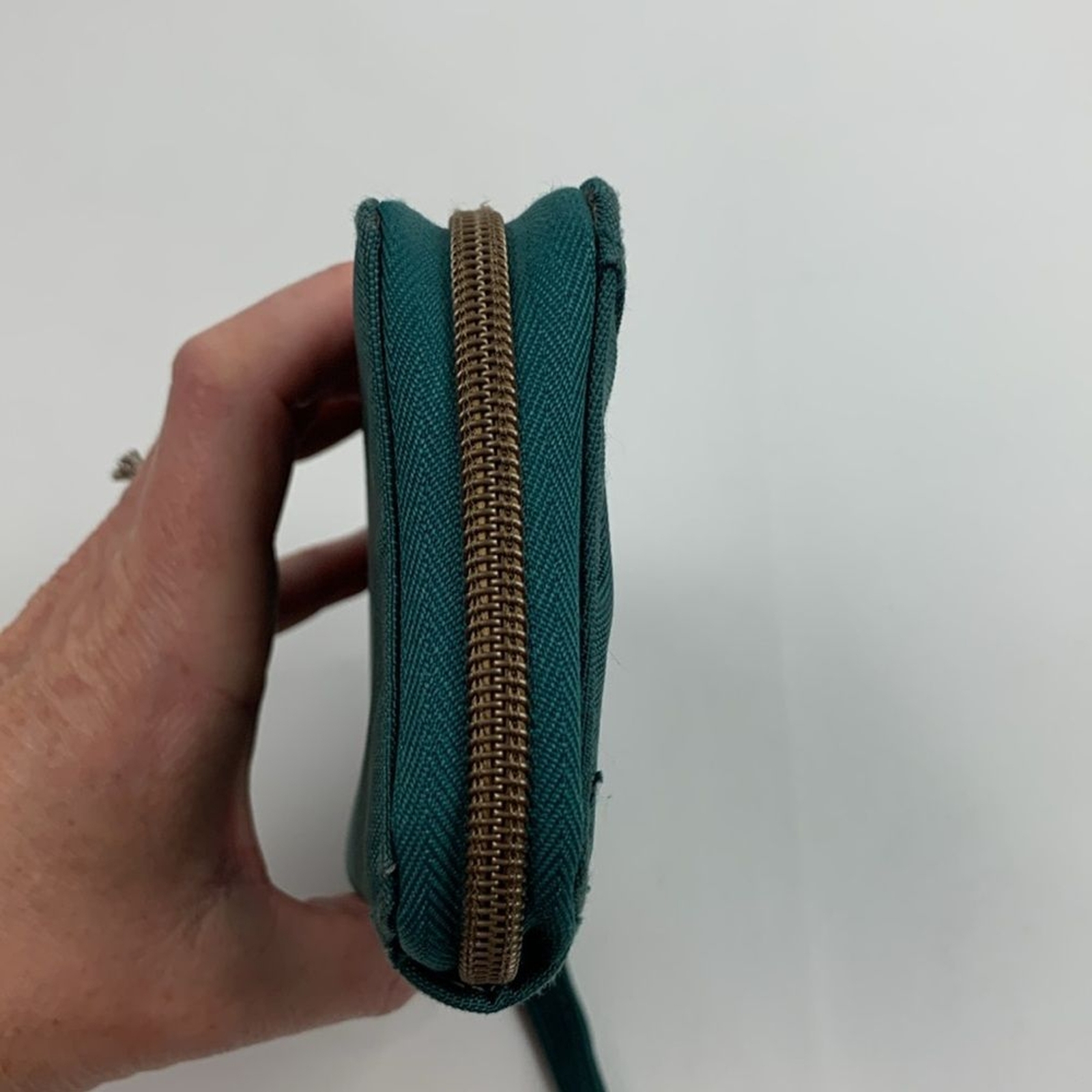 Travelon Dark Teal Green Clutch Wristlet wallet & brass Accents Zip around strap