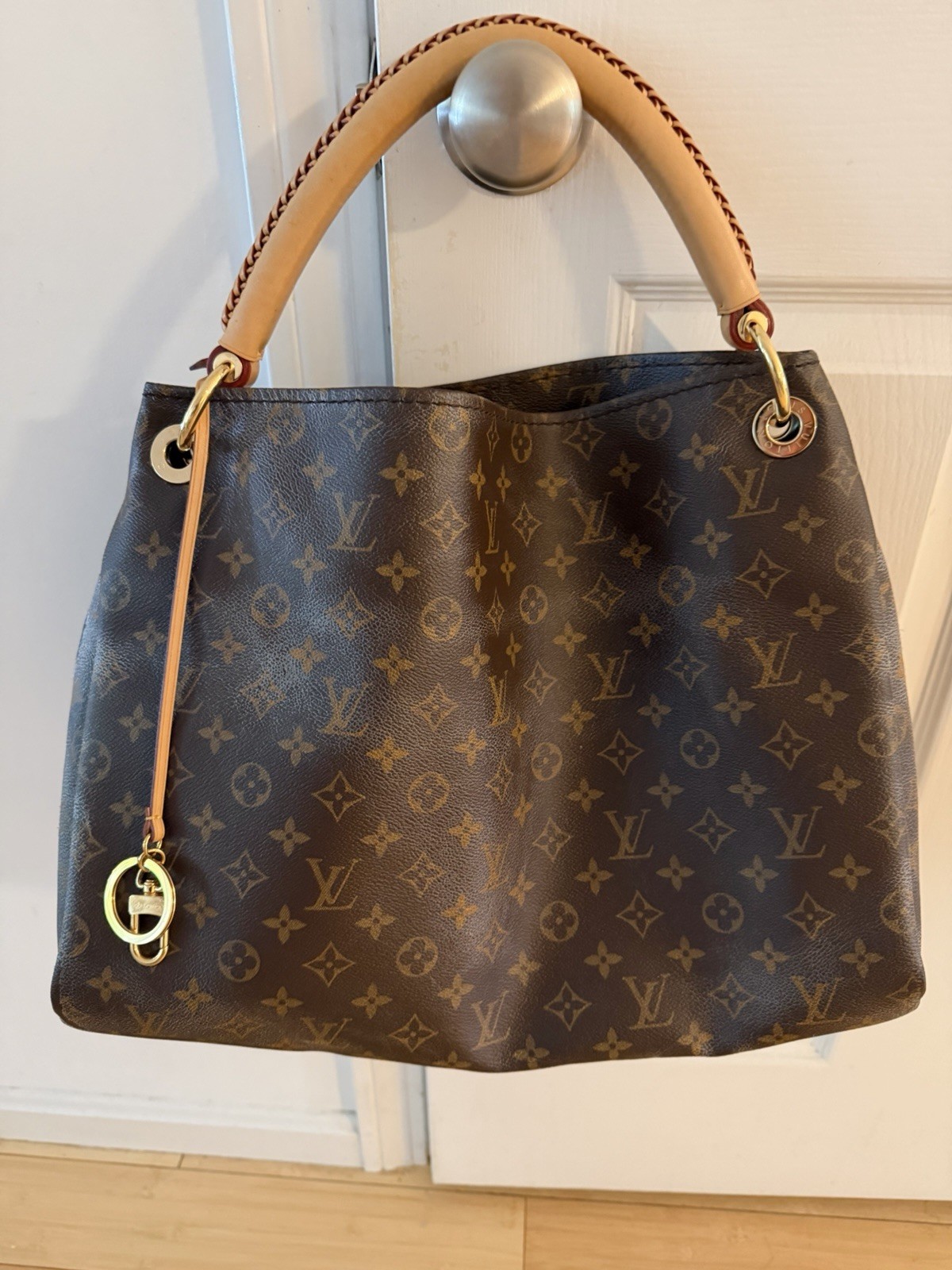 Authentic LOUIS VUITTON Monogram Artsy MM Shoulder Bag w/ original receipt.