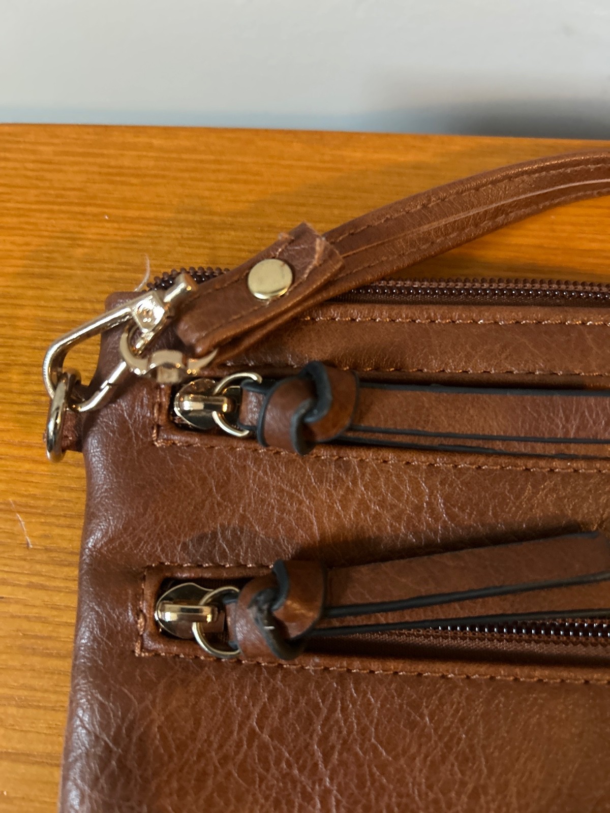 Faux leather zippered crossbody