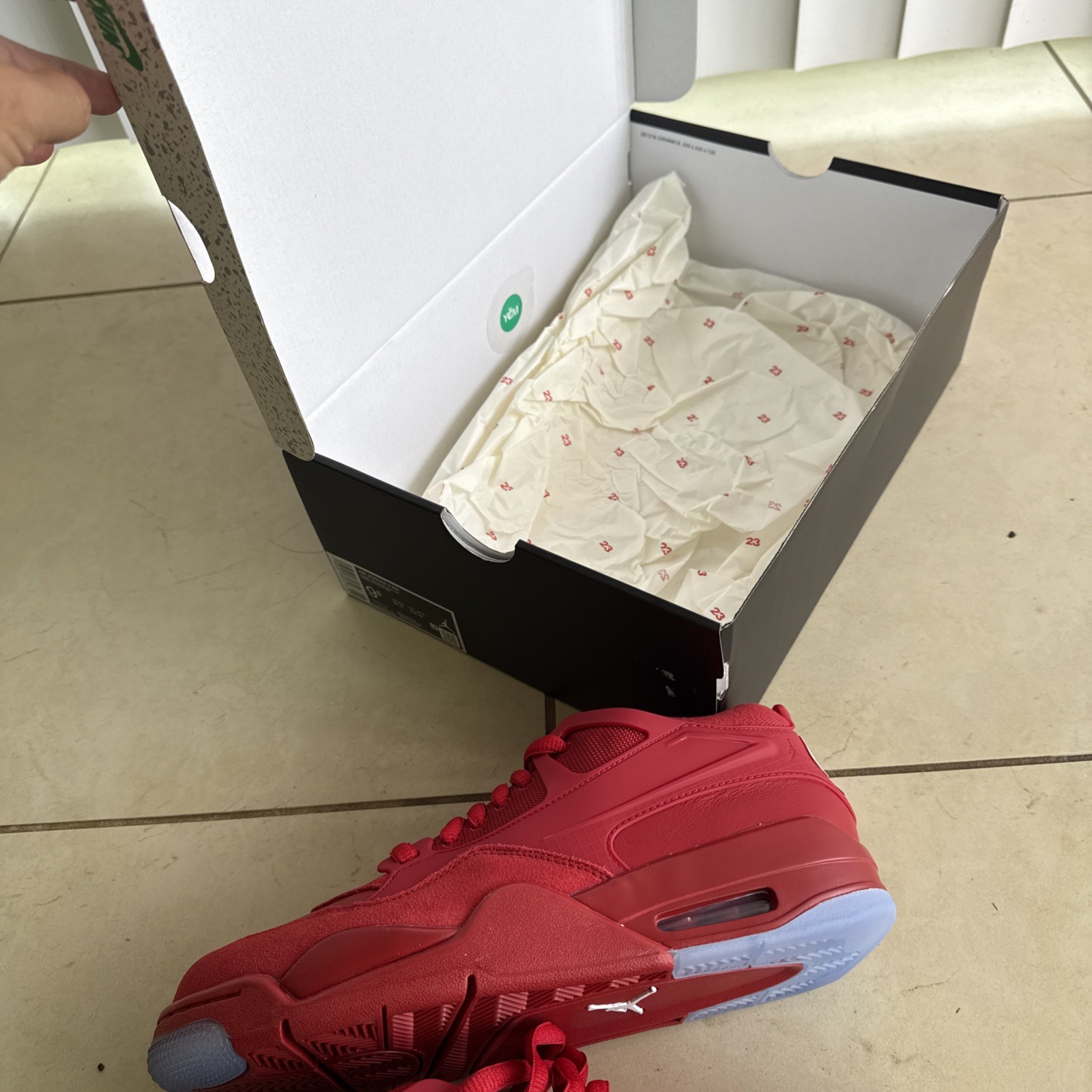 Size 9.5 – Air Jordan 4 RM Varsity Red