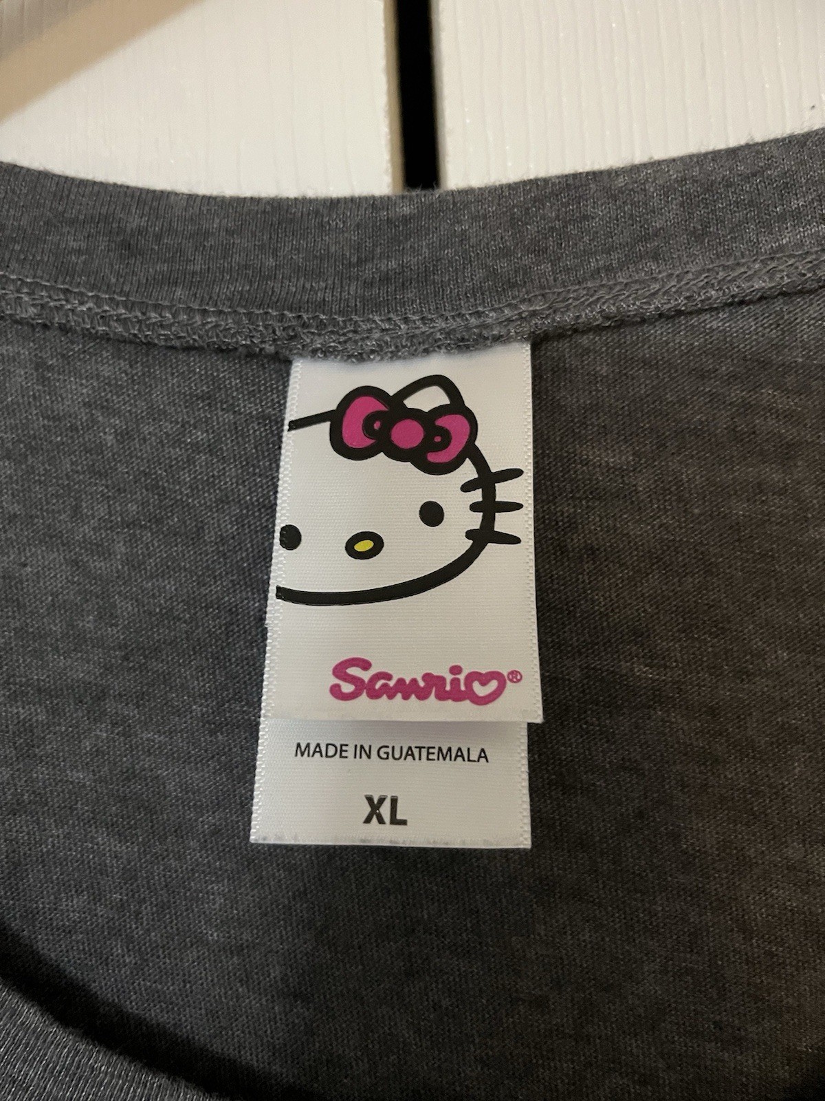 Sanrio Hello Kitty Wearing Glasses Shirt ,Dark Gray Size XL Poke Dots