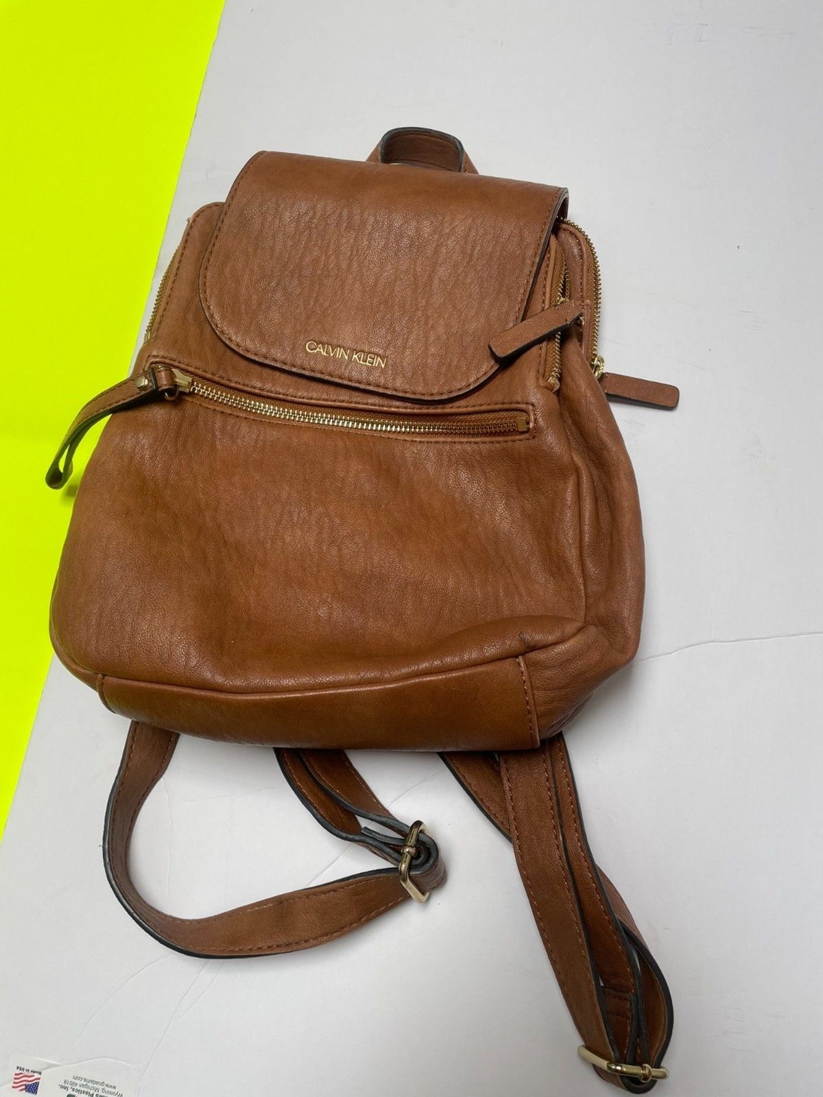 Calvin Klein Reyna Novelty Key Item Flap Backpack Caramel Color