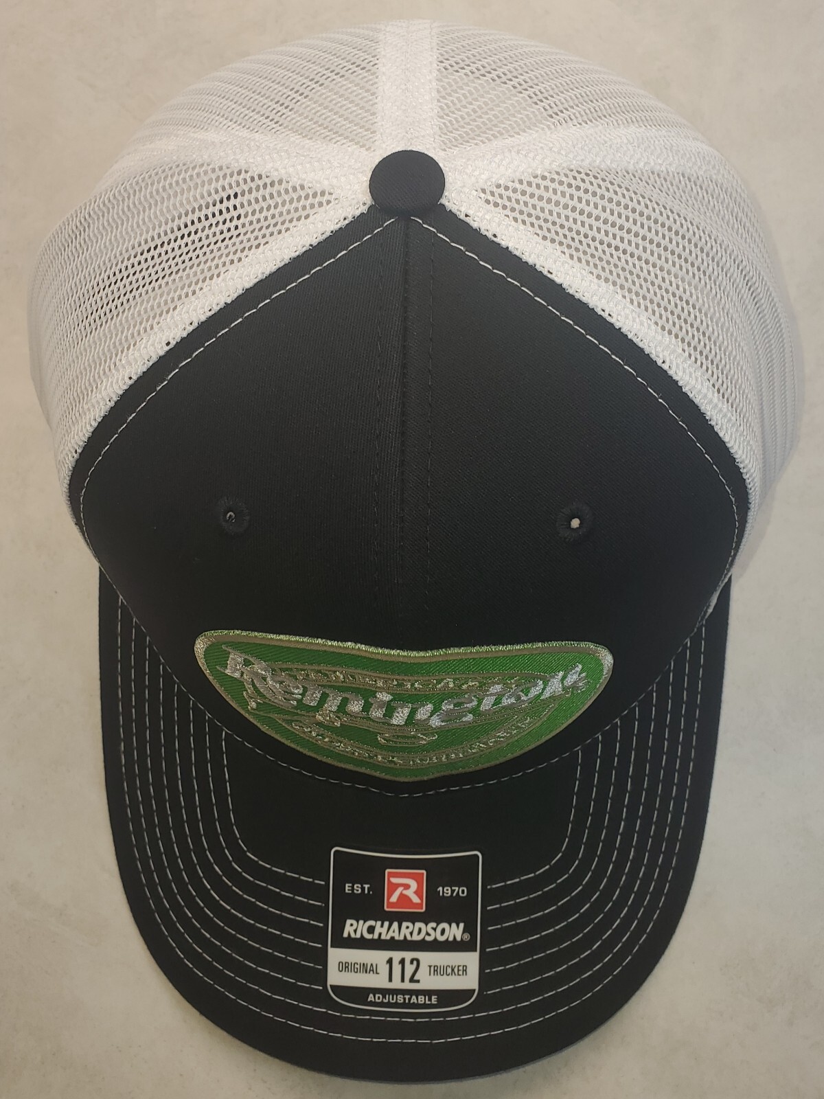 Remington Fire Arms Patch on Richardson 112 Trucker Hat Snapback Black/White