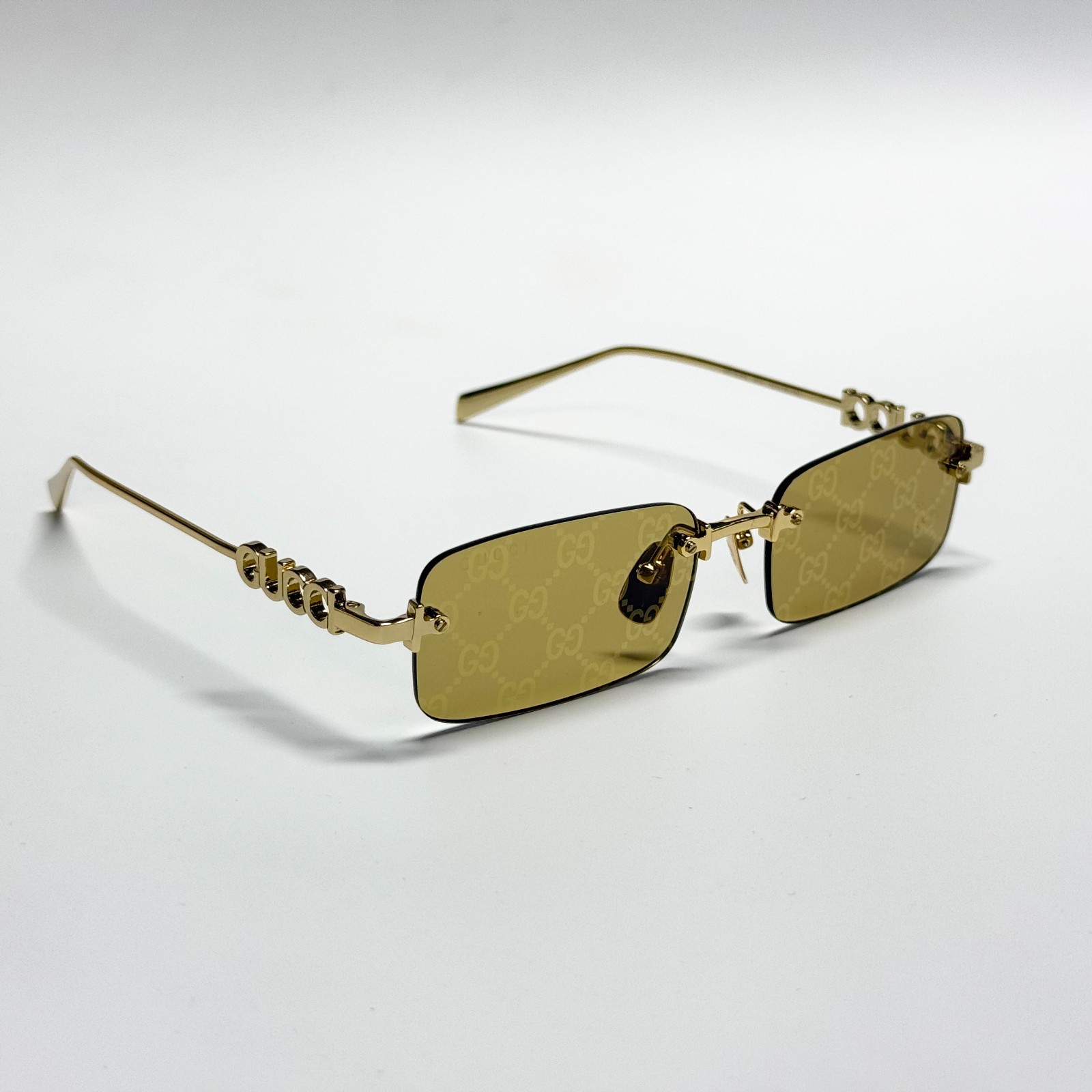 Gucci GG1808S Rimless Rectangle Sunglasses Gold Frame Gold GG Lens 52mm