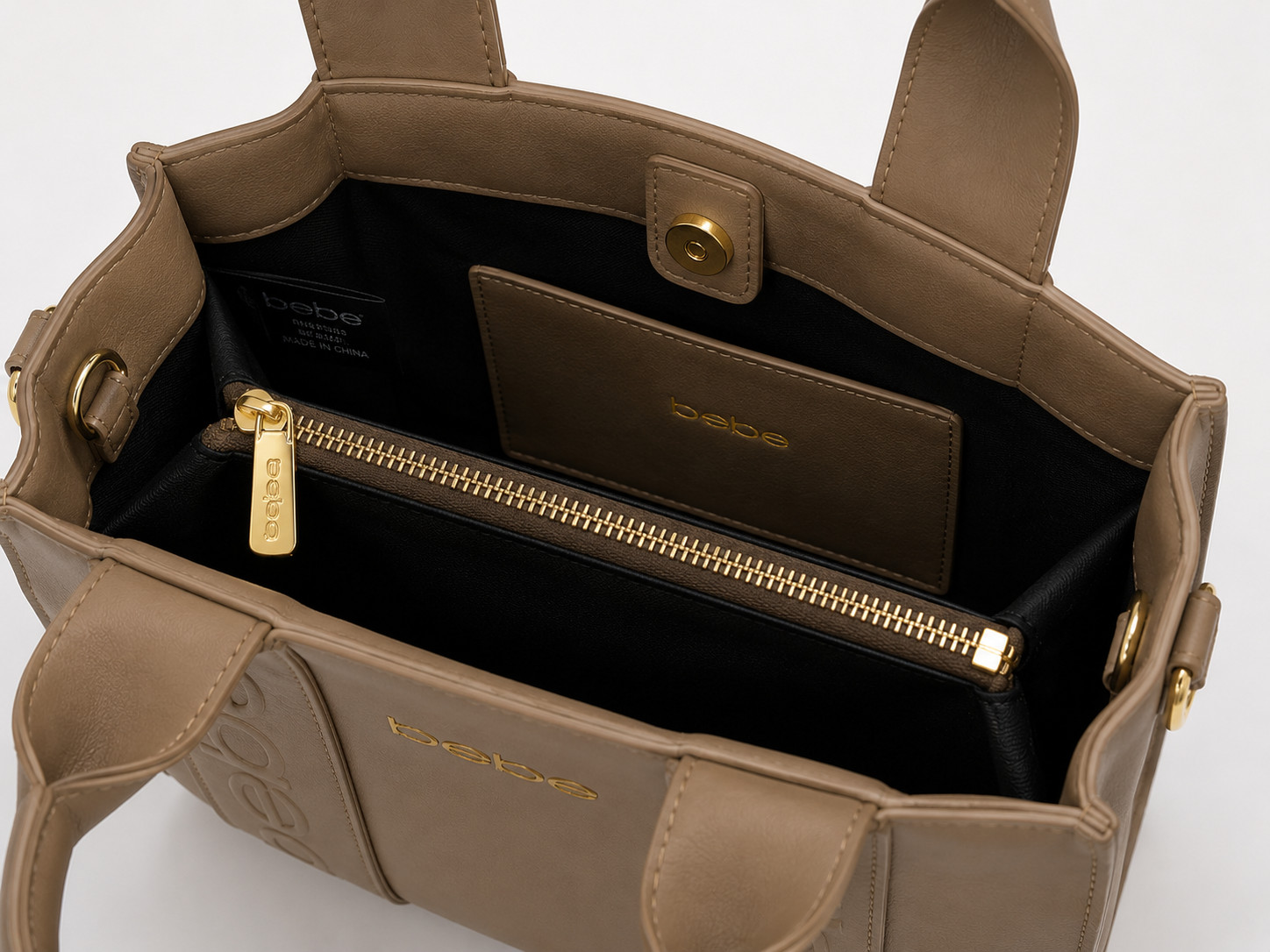 Elevate your style with this structured top-handle bag featuring sparkling logo