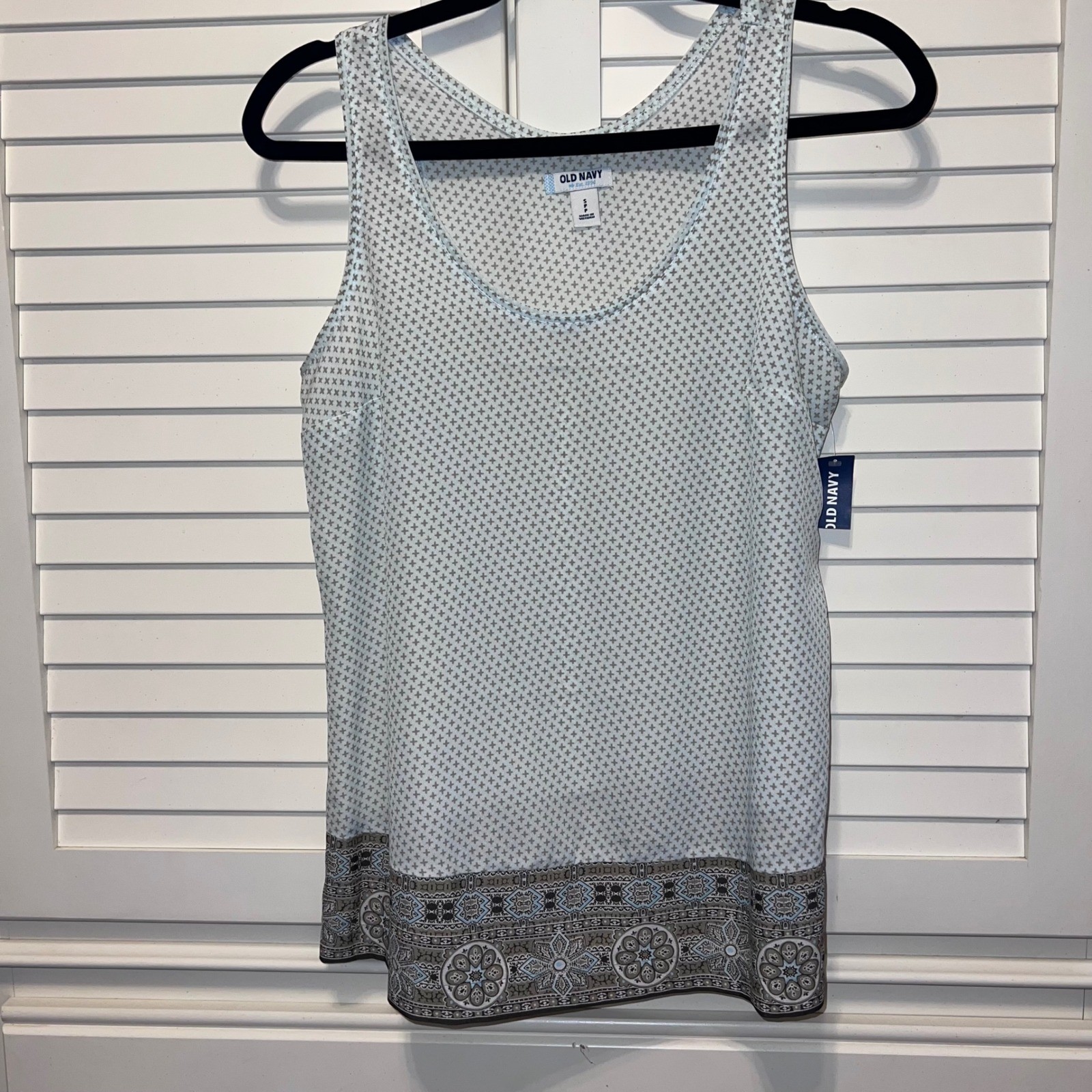 Sheer breezy tank for a hot summer day, nighttime outdoors