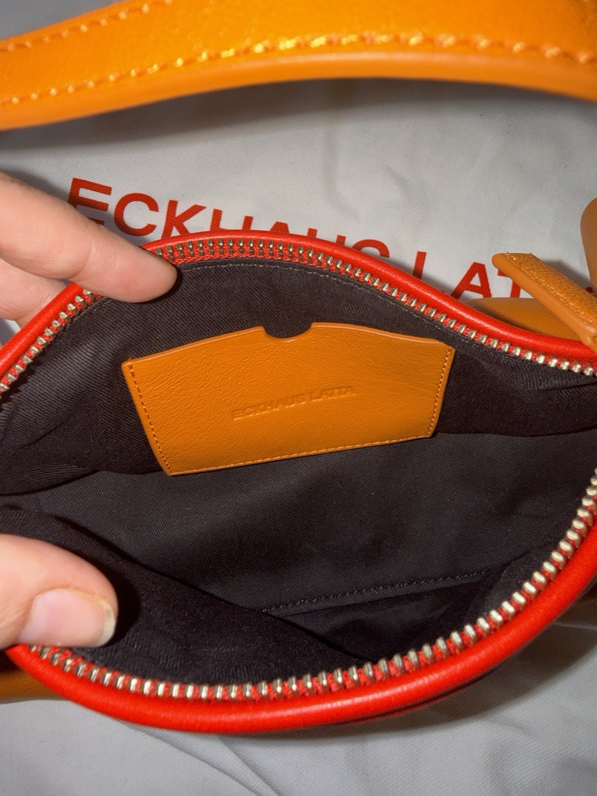 Eckhaus Latta The Crescent SS26 Orange/Red with dust bag