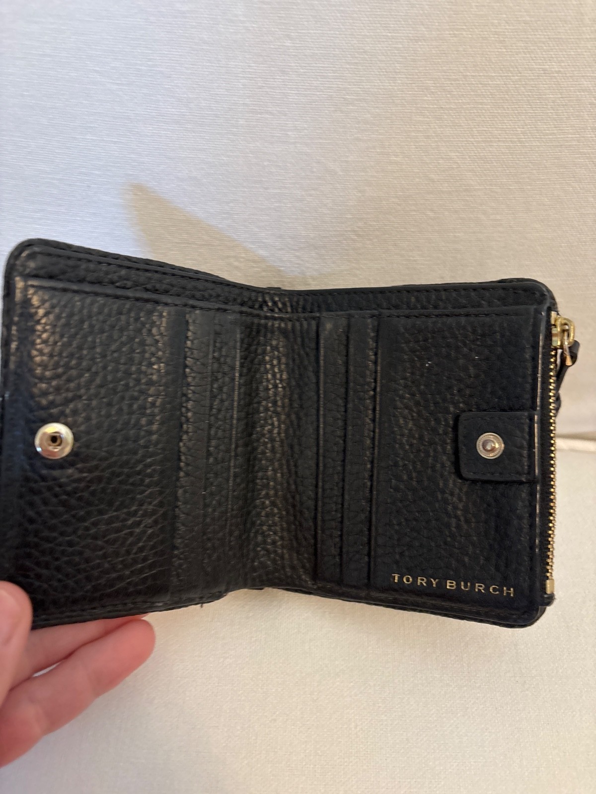 Tory Burch Thea Black Pebbled Leather Bifold Zip Wallet Tassel Gold Tone Logo