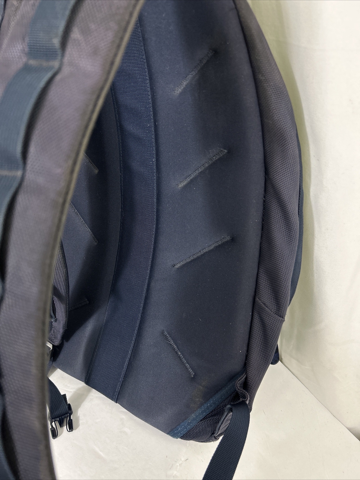 The North Face Lineage 20L backpack book bag navy used Flaw Small Rip On Side