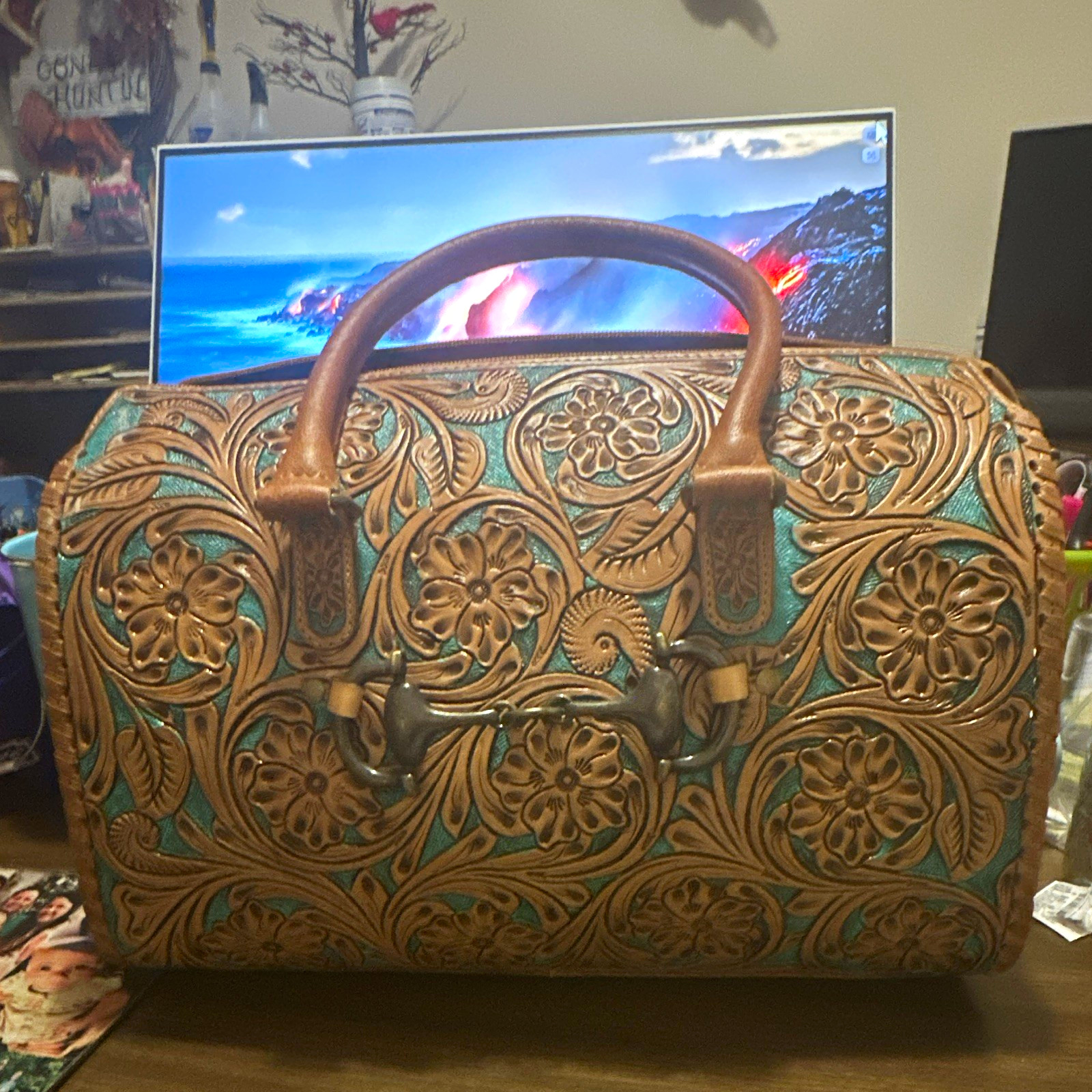 Women’& Turquoise Floral Tooled Bought never used strap still in bag.. Large