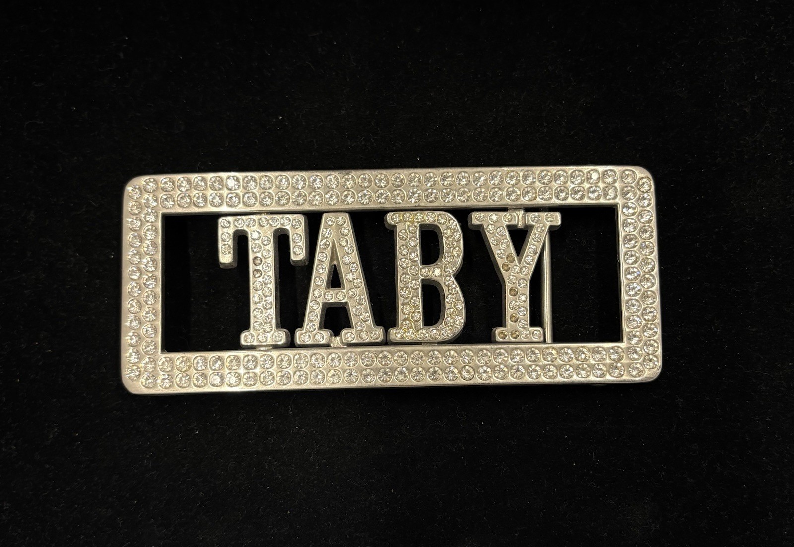 vintage Y2K-style belt buckle features “TABY” rhinestones rectangular frame RARE