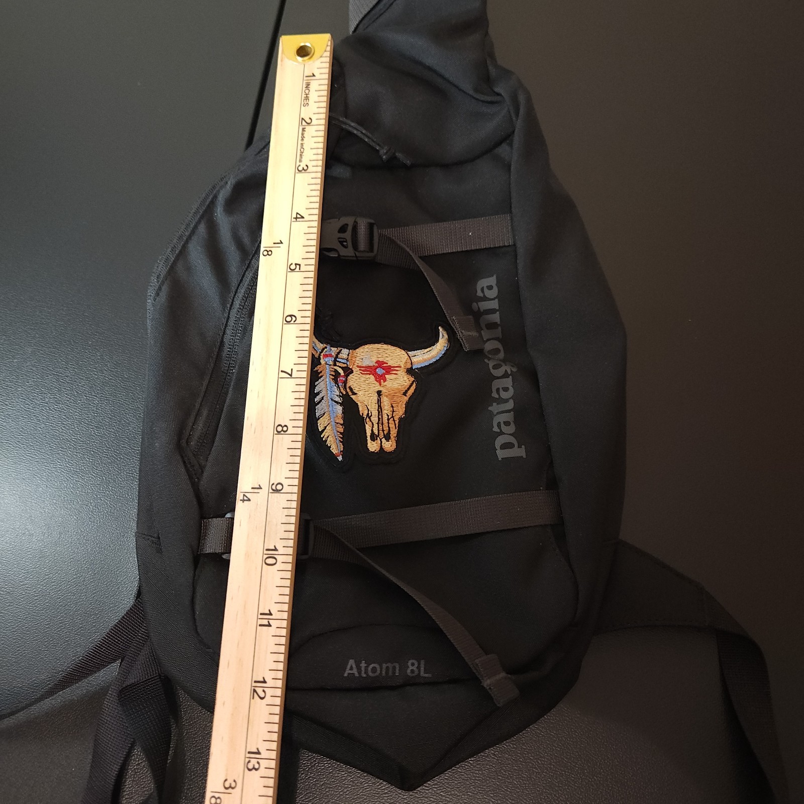 Patagonia Atom 8L Sling Bag Black Gray Crossbody Bull Skull Patch Hiking Travel