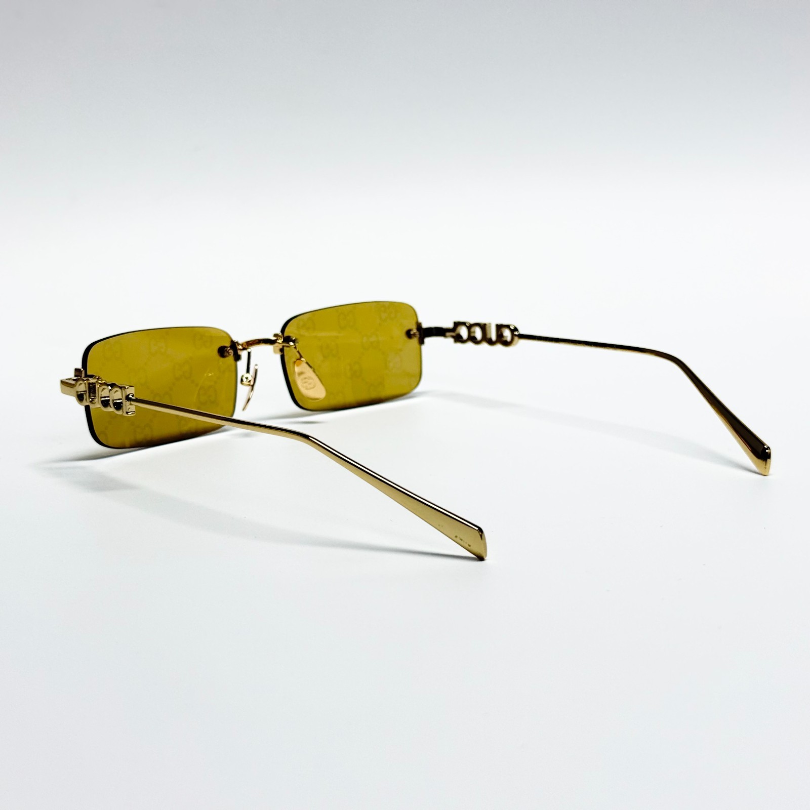 Gucci GG1808S Rimless Rectangle Sunglasses Gold Frame Gold GG Lens 52mm