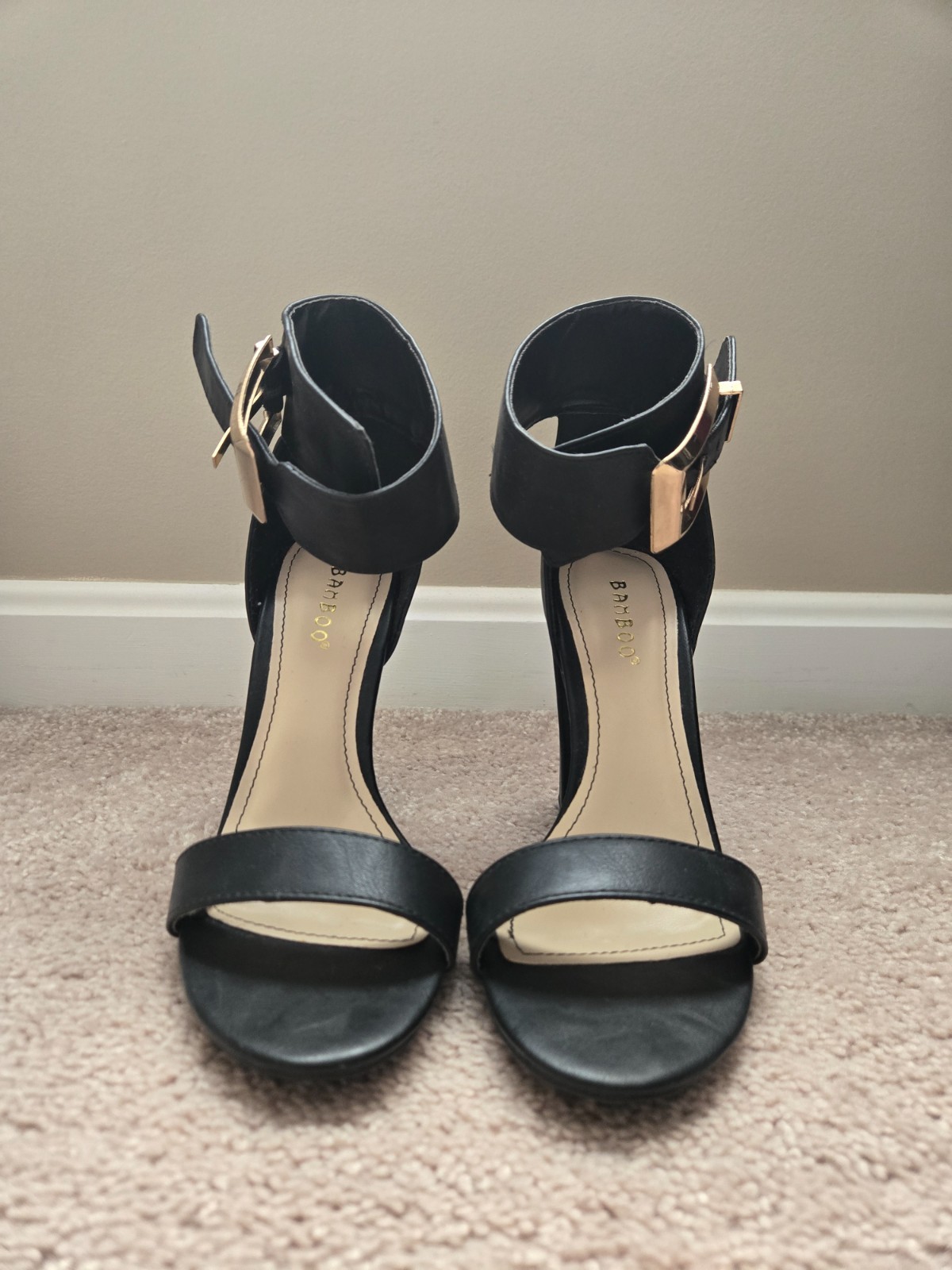 Black bamboo brand faux leather high heels size 6. Buckle strap