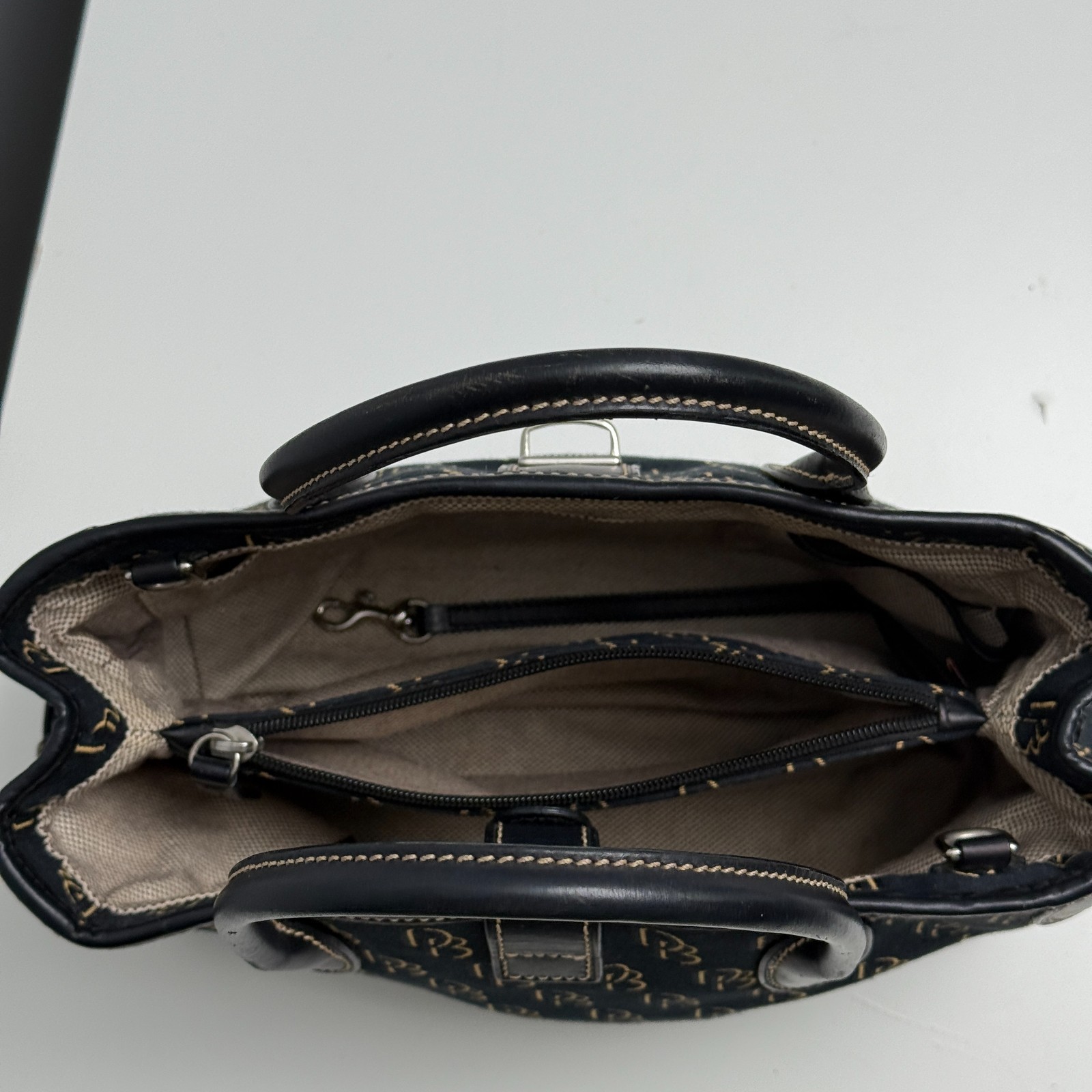 Dooney & Bourke DB Monogram Satchel Purse Black Gold Leather Trim Push Lock