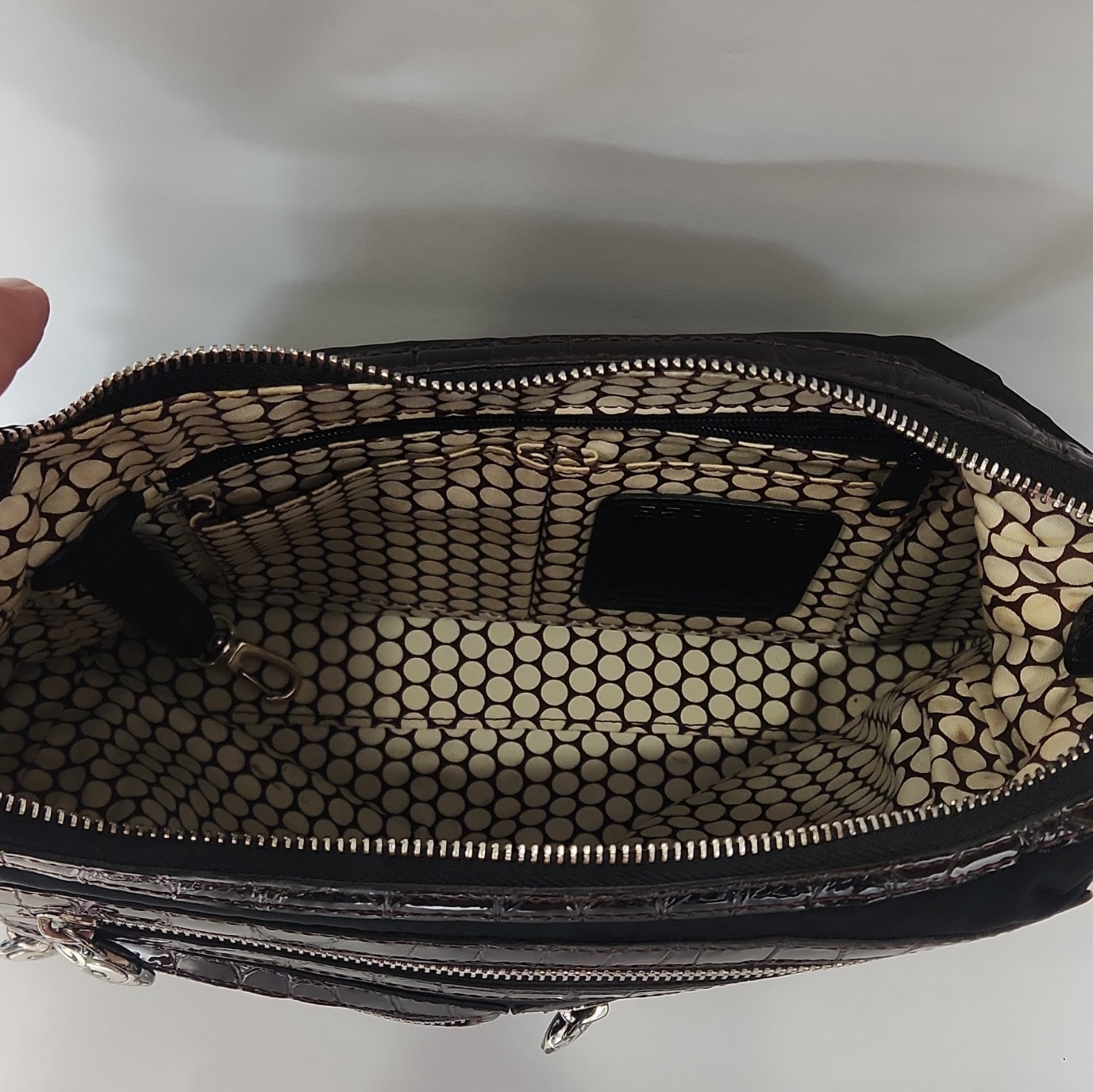 Brighton Black Crossbody Bag, Adjustable Strap, Zip, Pockets, Charm