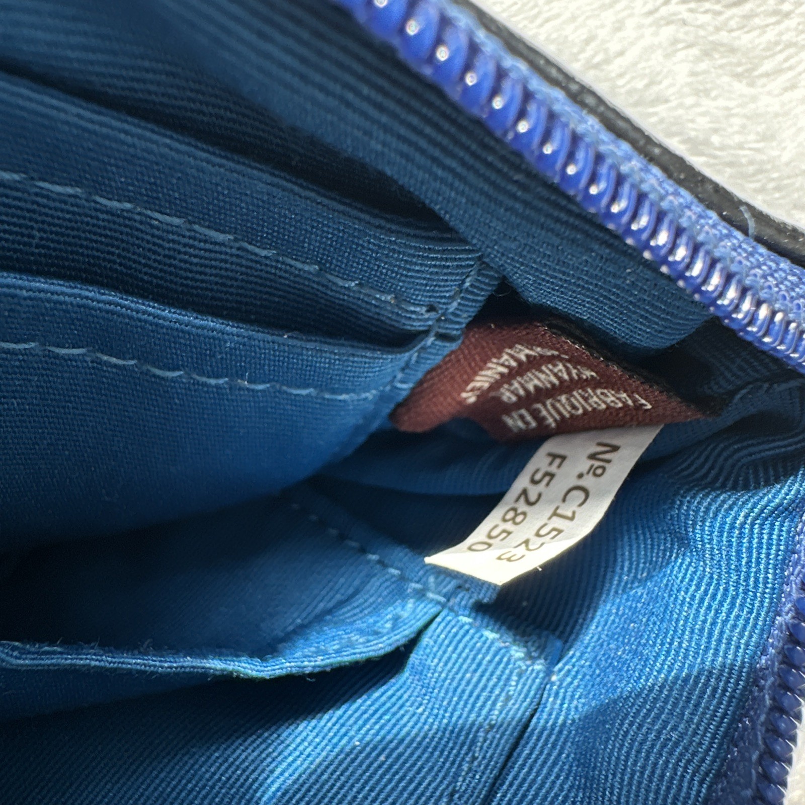COACH Corner Zip Wristlet In Pebbled Leather Royal Blue