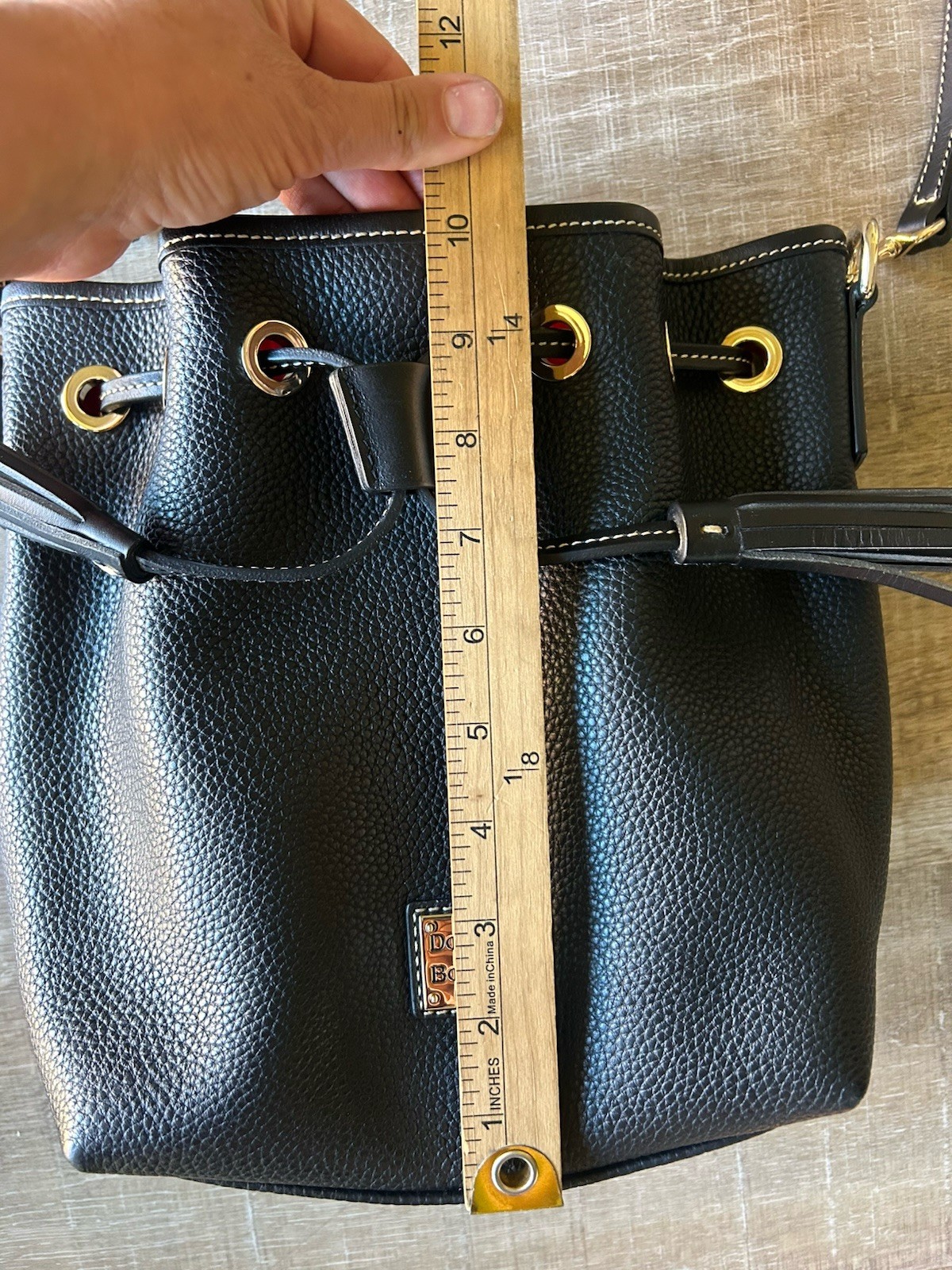 Dooney & Bourke Pebble Grain Leather Drawstring Bucket Bag Black Tassel