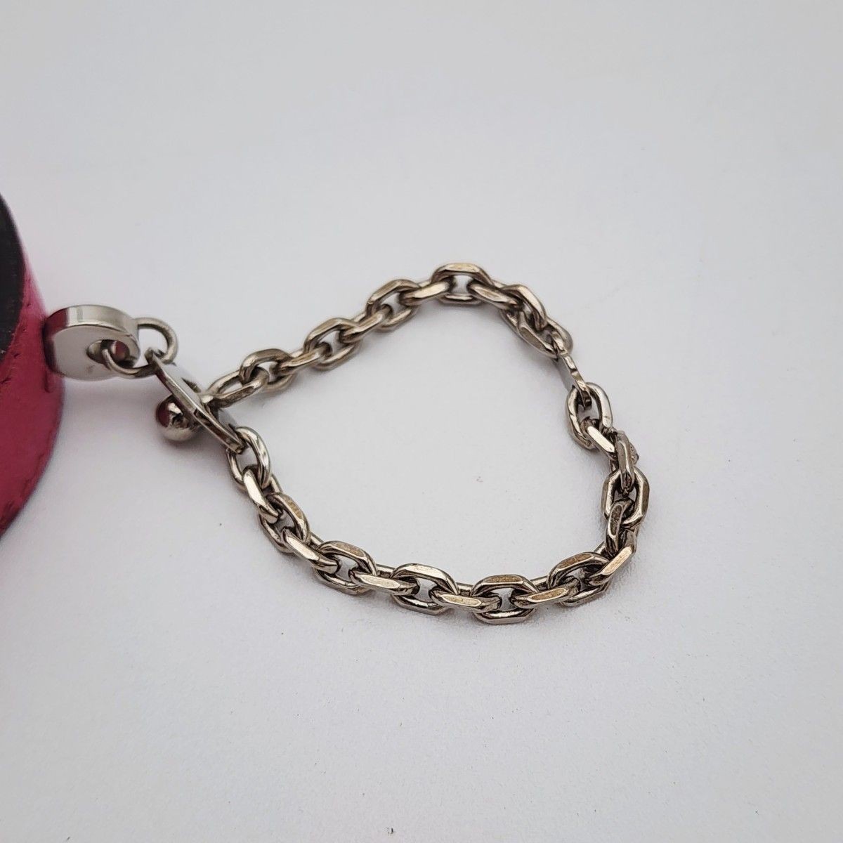 HERMES Nomad Glove Holder Ostrich Leather Silver Hardware Pink 3.5cm Diameter