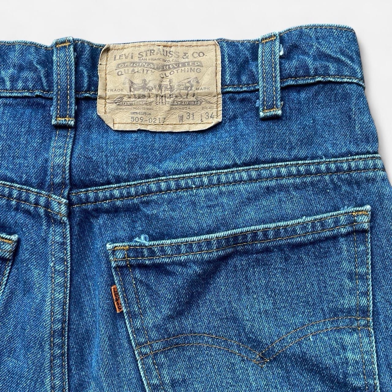 Vintage 70/80s Levi’s 509 orange tab dark wash straight leg jeans