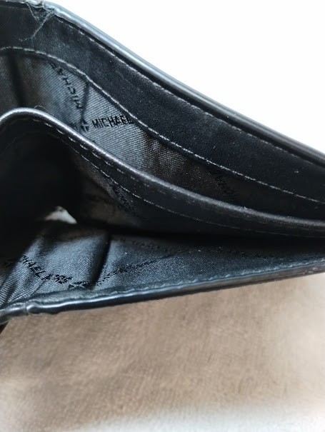 MICHAEL KORS black leather mens wallet, good condition, dual bill slots