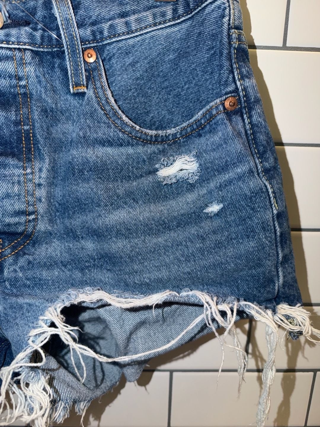 Levi’s 501 Original High Rise Distressed Denim Cut Off Shorts
