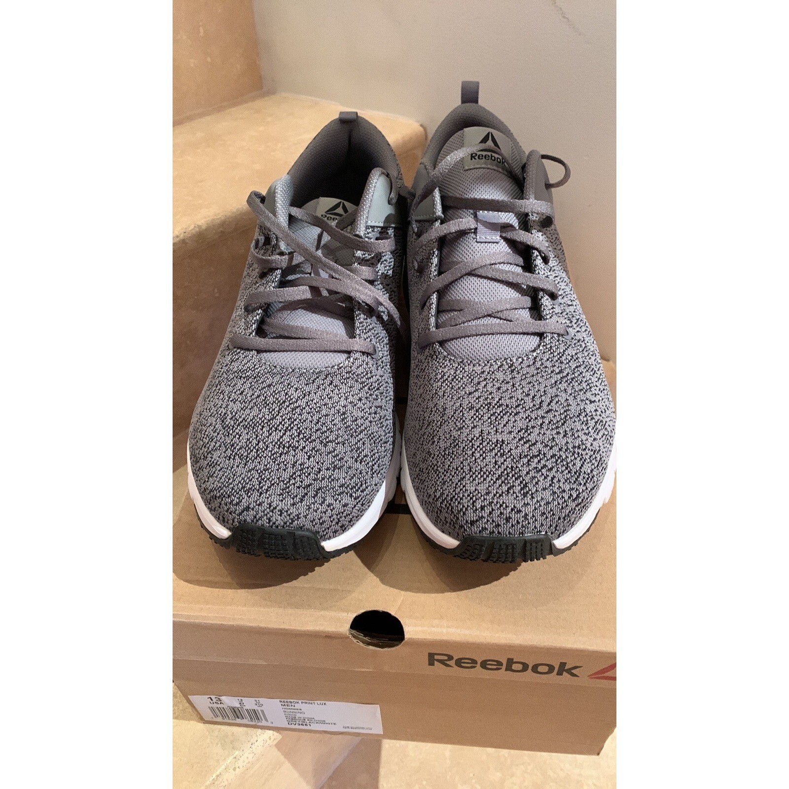 REEBOK. NWOT. Print Lux.Grey/White/Black running Sneakers. Rubber soles. W/Box.