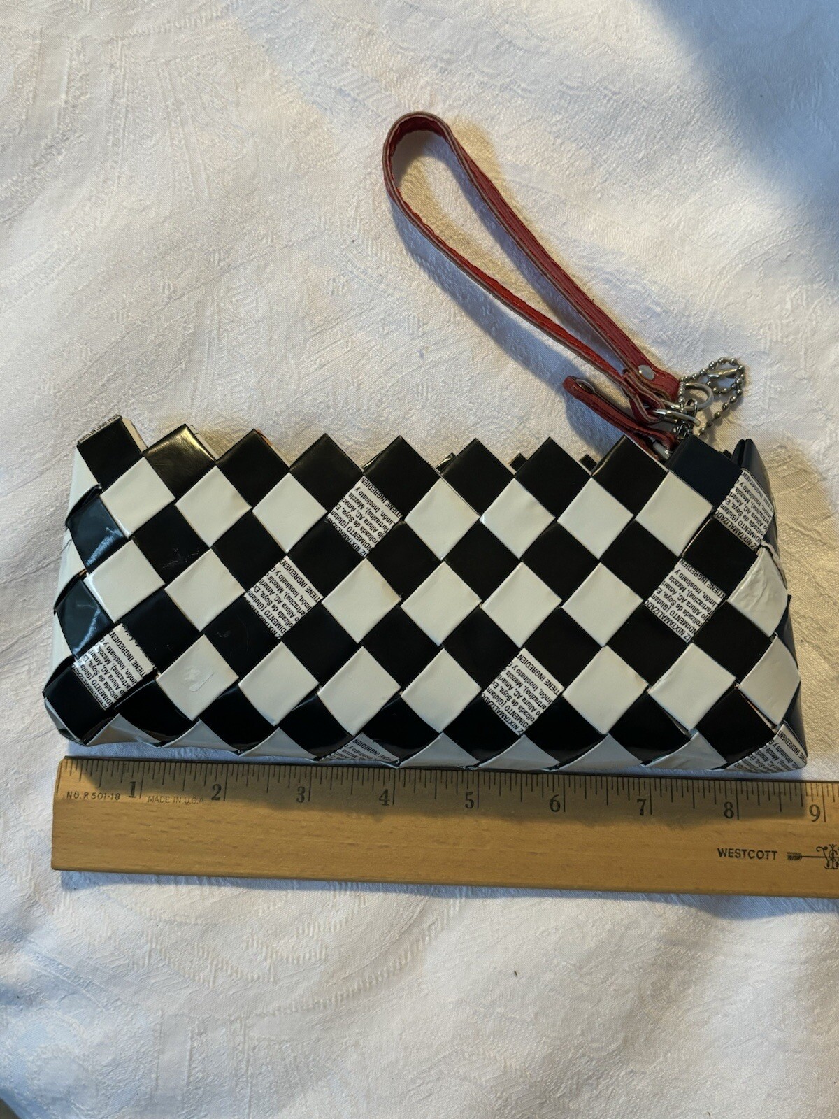Nahui Ollin Black And White Candy Wrapper Zipper Closure Clutch Purse Bag