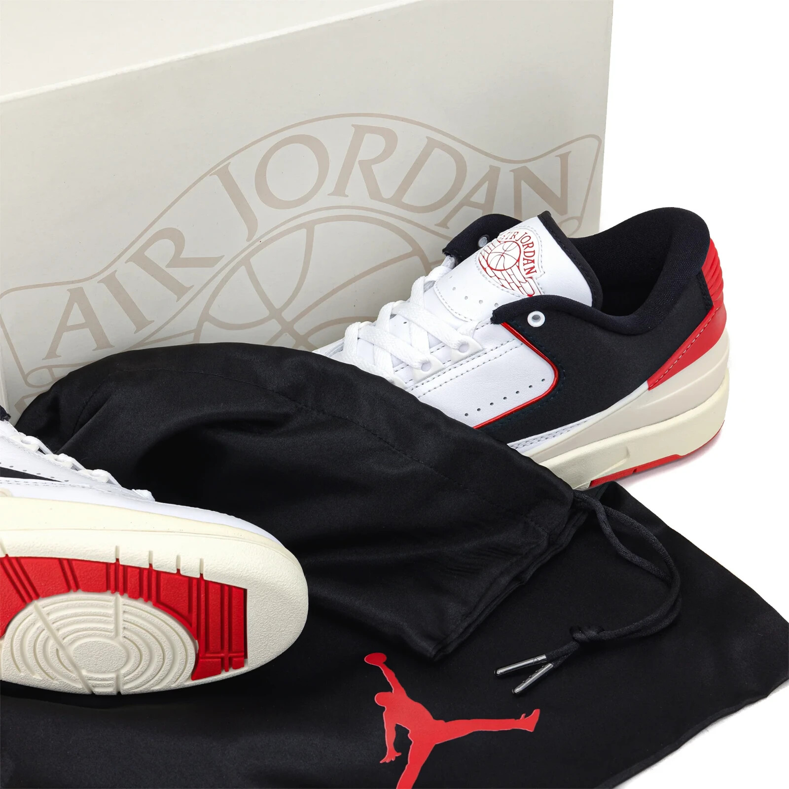 The Air Jordan 2 Retro “White,” “Black,” “University Red” womens 10.5 mens 9