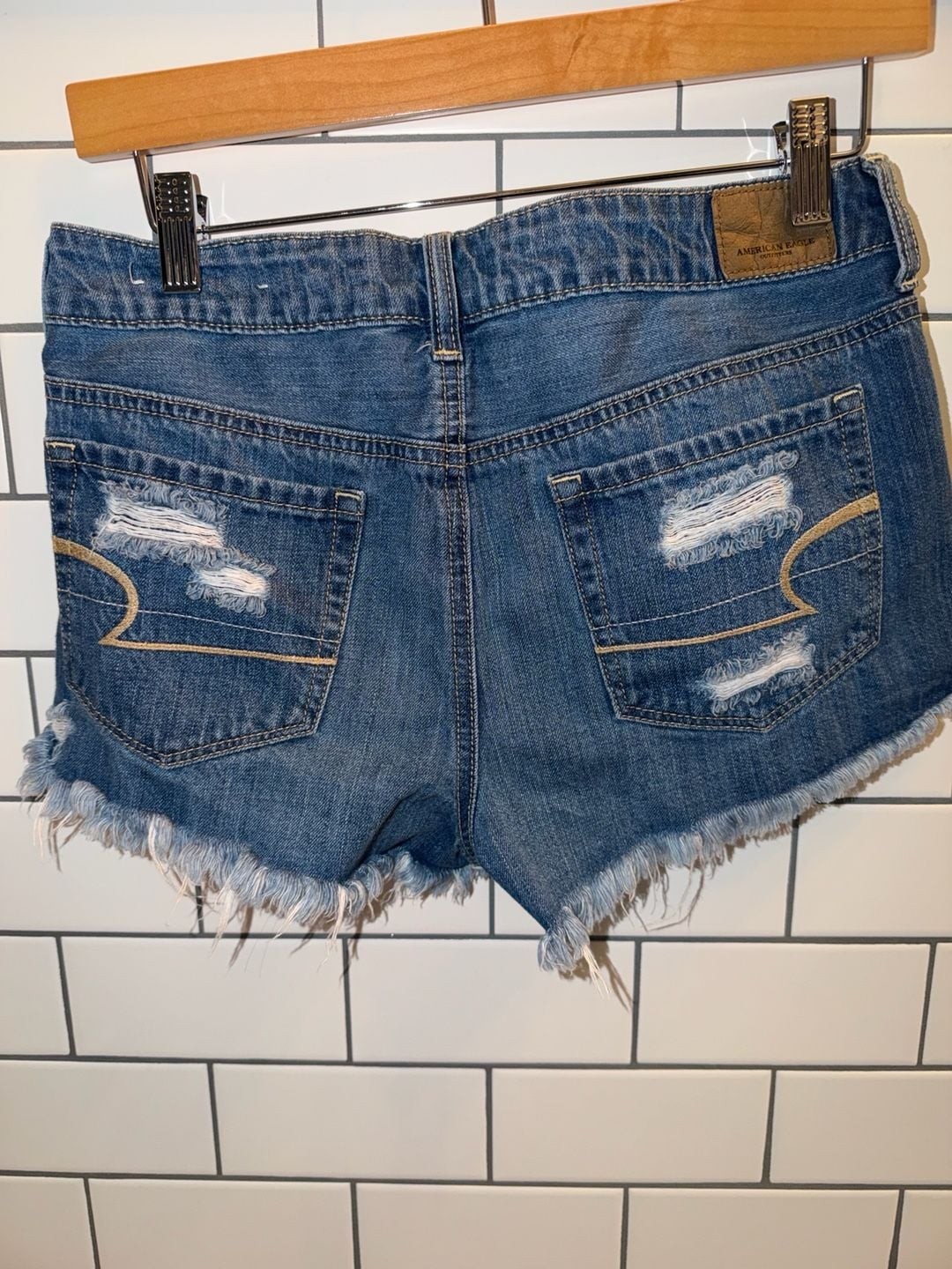 American Eagle Distressed Tomgirl Shortie Denim Shorts