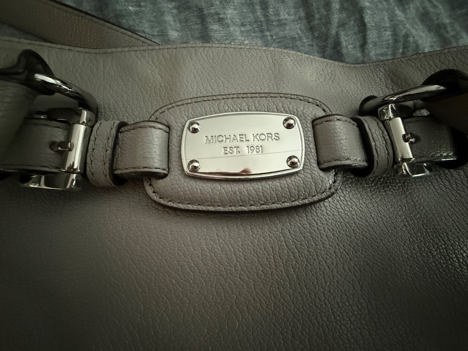 Michael Kors Hamilton Large EW Tote Bag in Heather Gray with silver hardware.