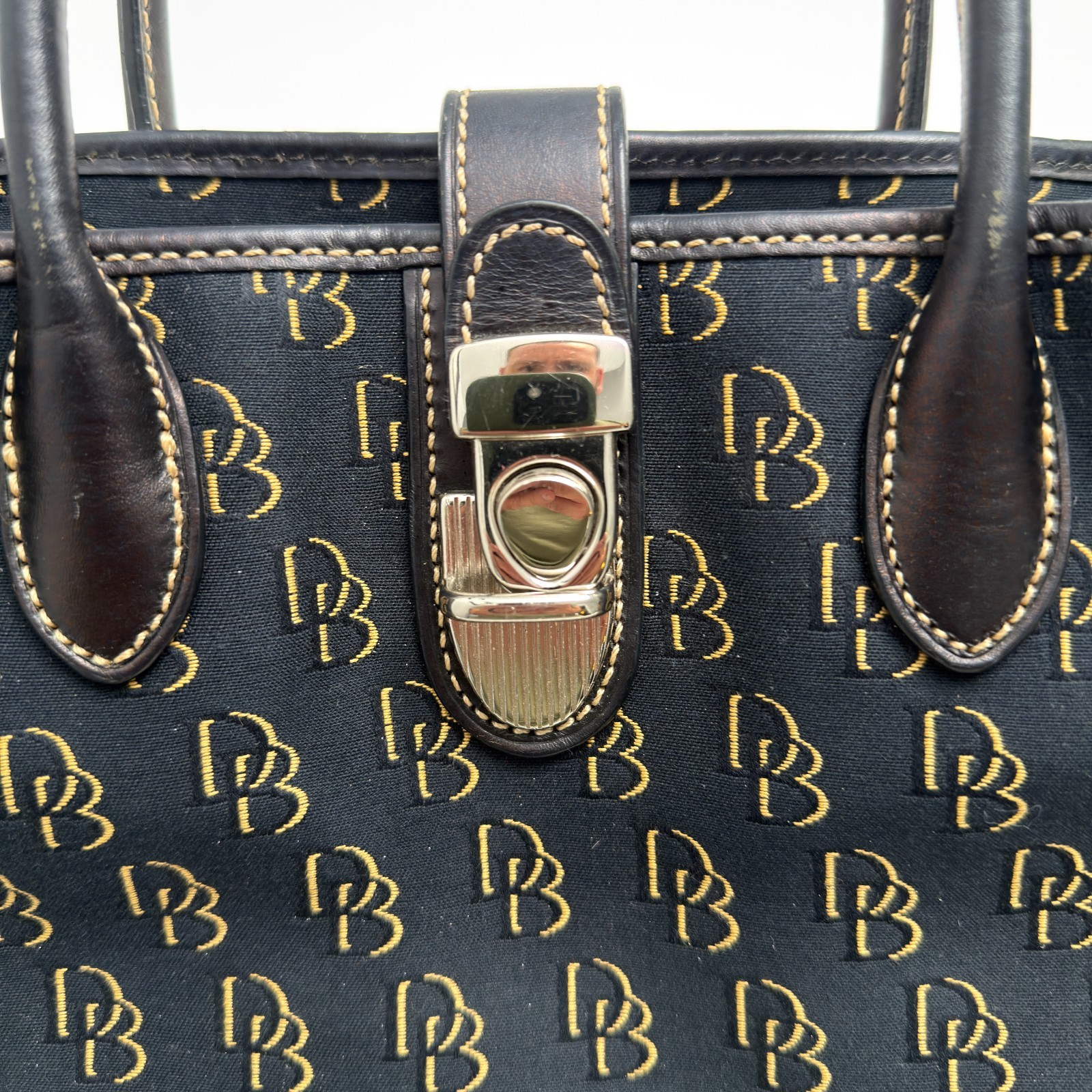 Dooney & Bourke DB Monogram Satchel Purse Black Gold Leather Trim Push Lock