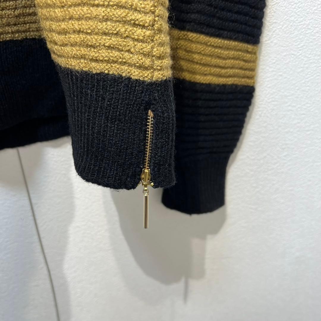 CULLNI Wool striped knit sweater with side zip design