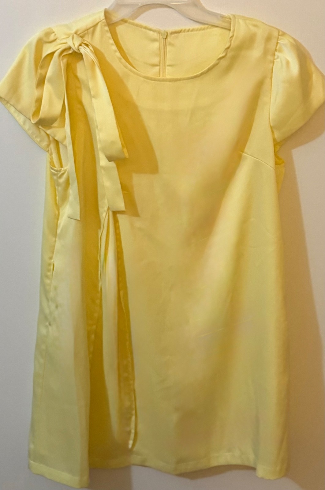 Women’s dress, yellow,short,beautiful side details, elegant, elevate your style.