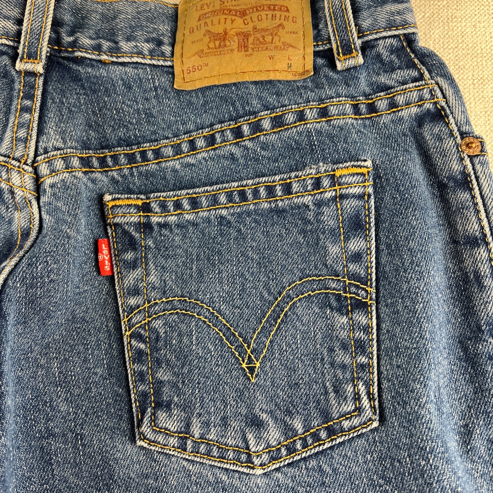 Vtg 90s Levis 550 10in Rise Mom Jeans size 10 Petite Classic Relaxed fit