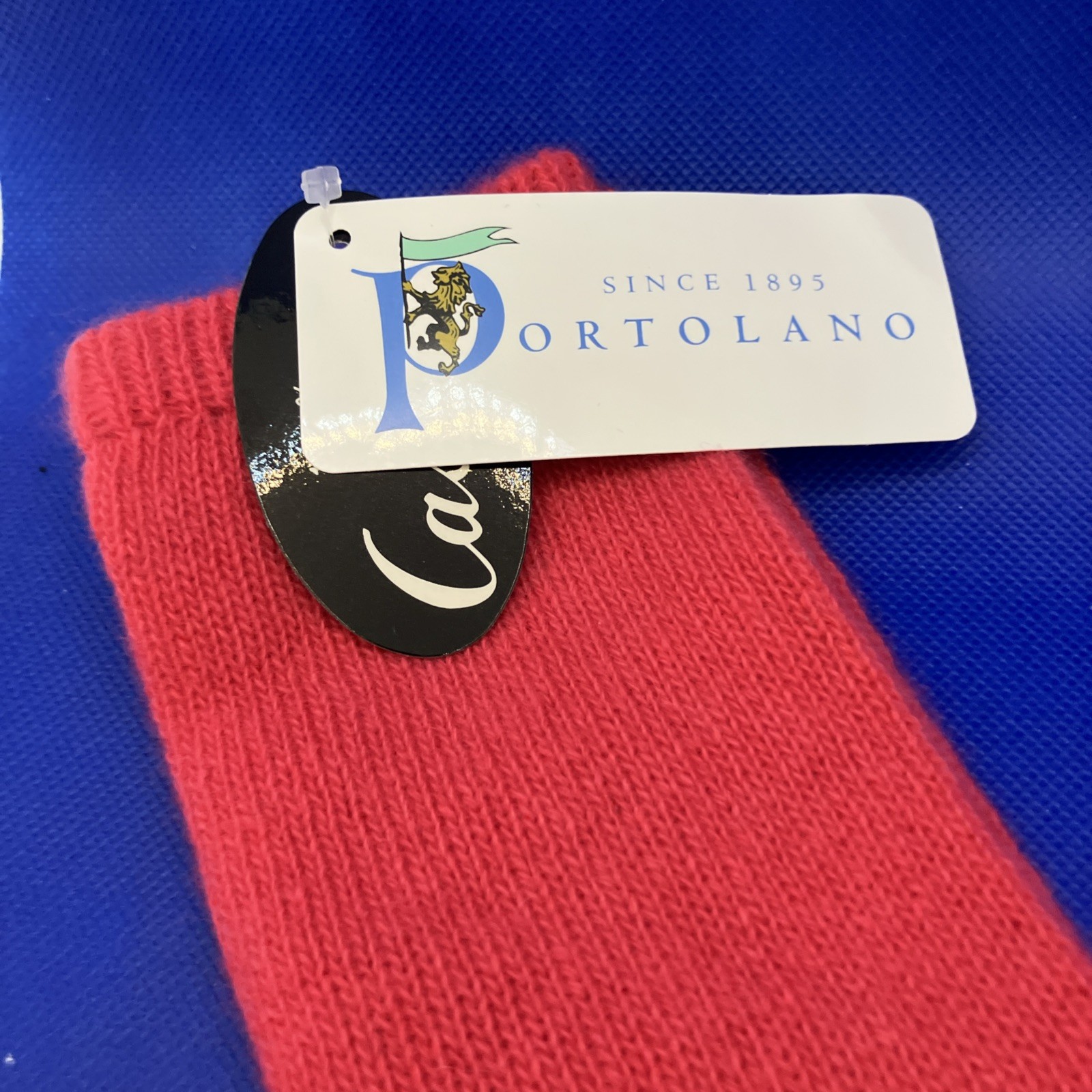 Portolano 13″ cashmere gloves in a bright pink/coral color